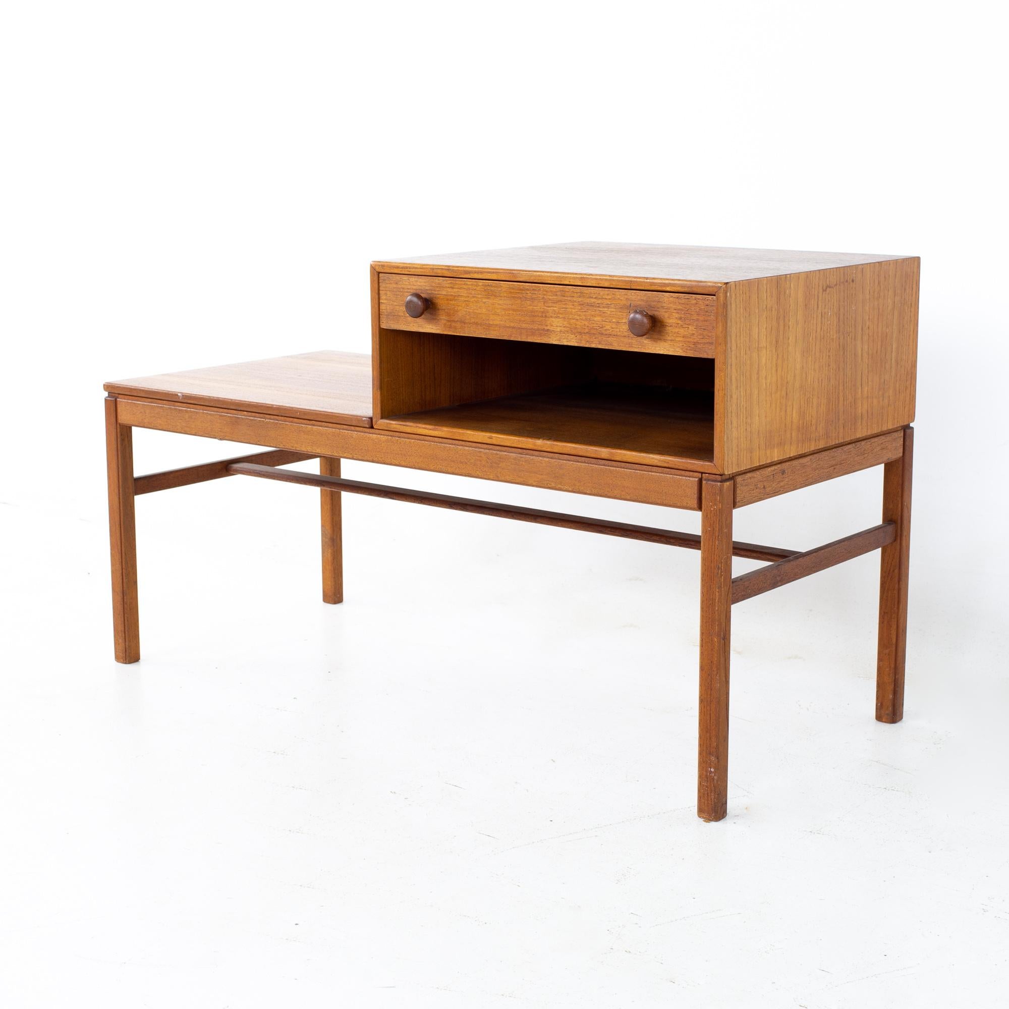 Sven Engstrom Mid Century Teak (Casino) Foyer Entry Bench

Table measures: 39.5 wide x 17.5 deep x 15.75 inches high; the height of the drawer is 23.25 inches

All pieces of furniture can be had in what we call restored vintage condition. That means
