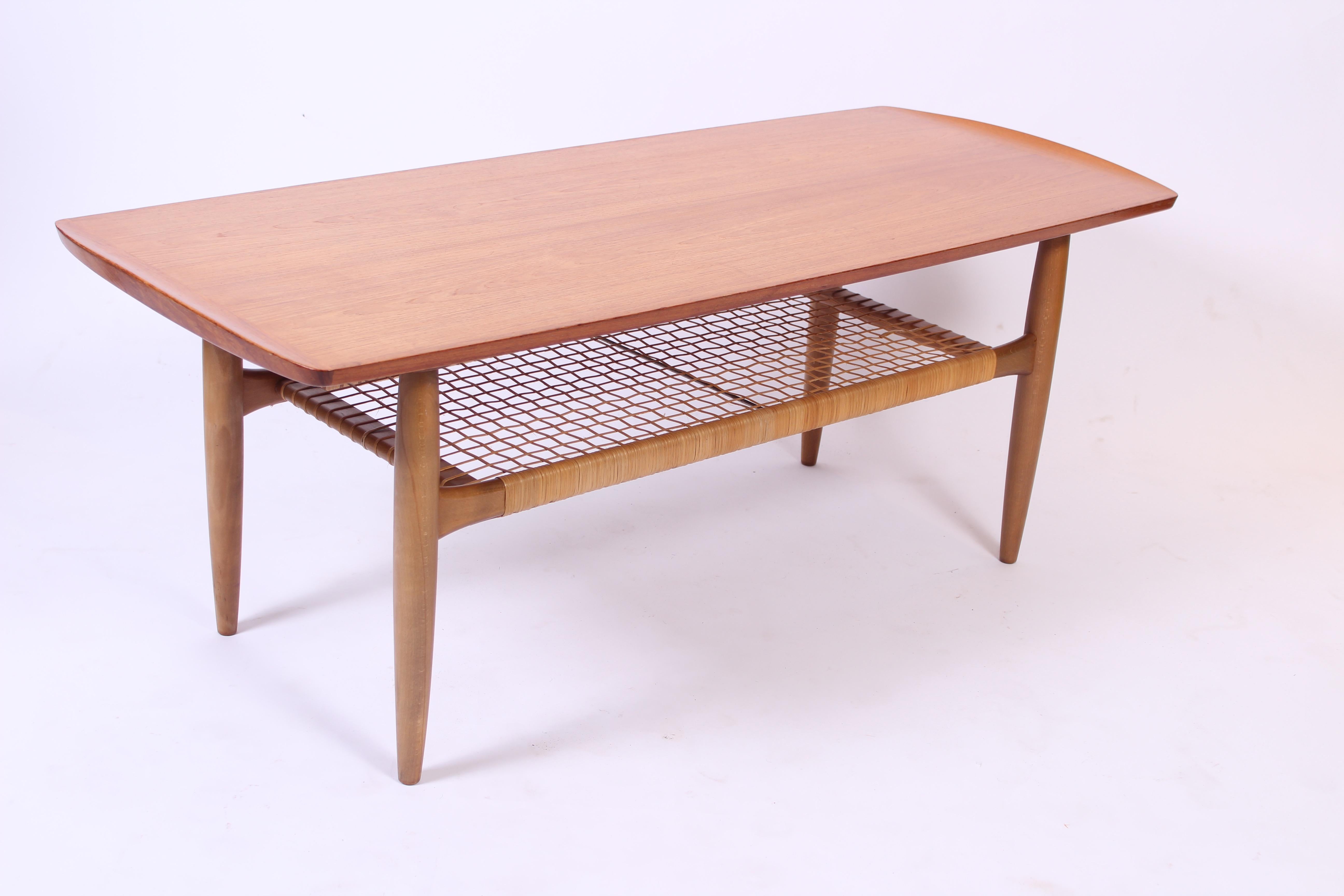 Midcentury Teak Coffee Table with Rattan Shelf by Kurt Østervig, 1950s 1