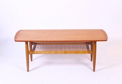 Midcentury Teak Coffee Table with Rattan Shelf by Kurt Østervig, 1950s