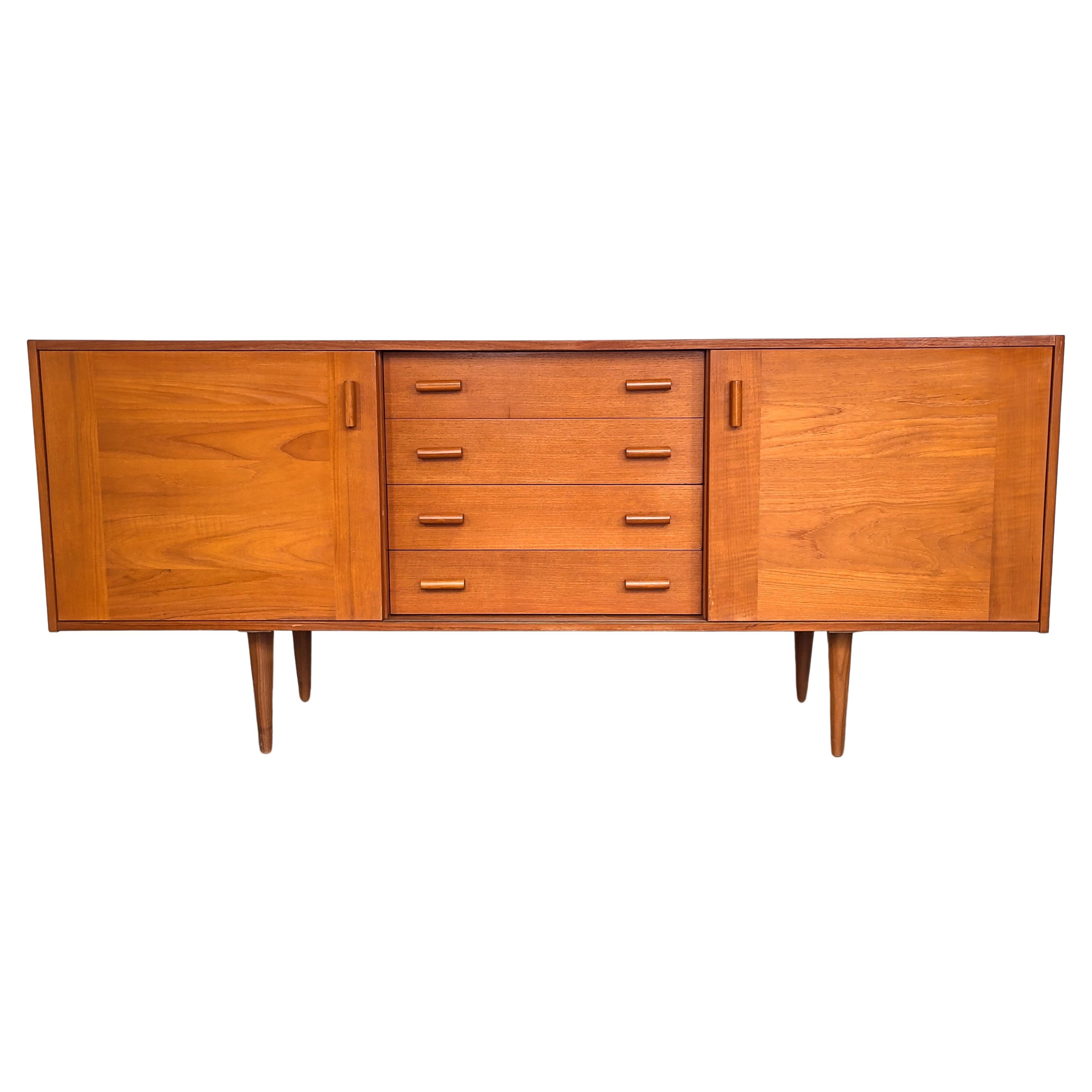 Mid-Century Teak Credenza with Sliding Doors by Domino Møbler