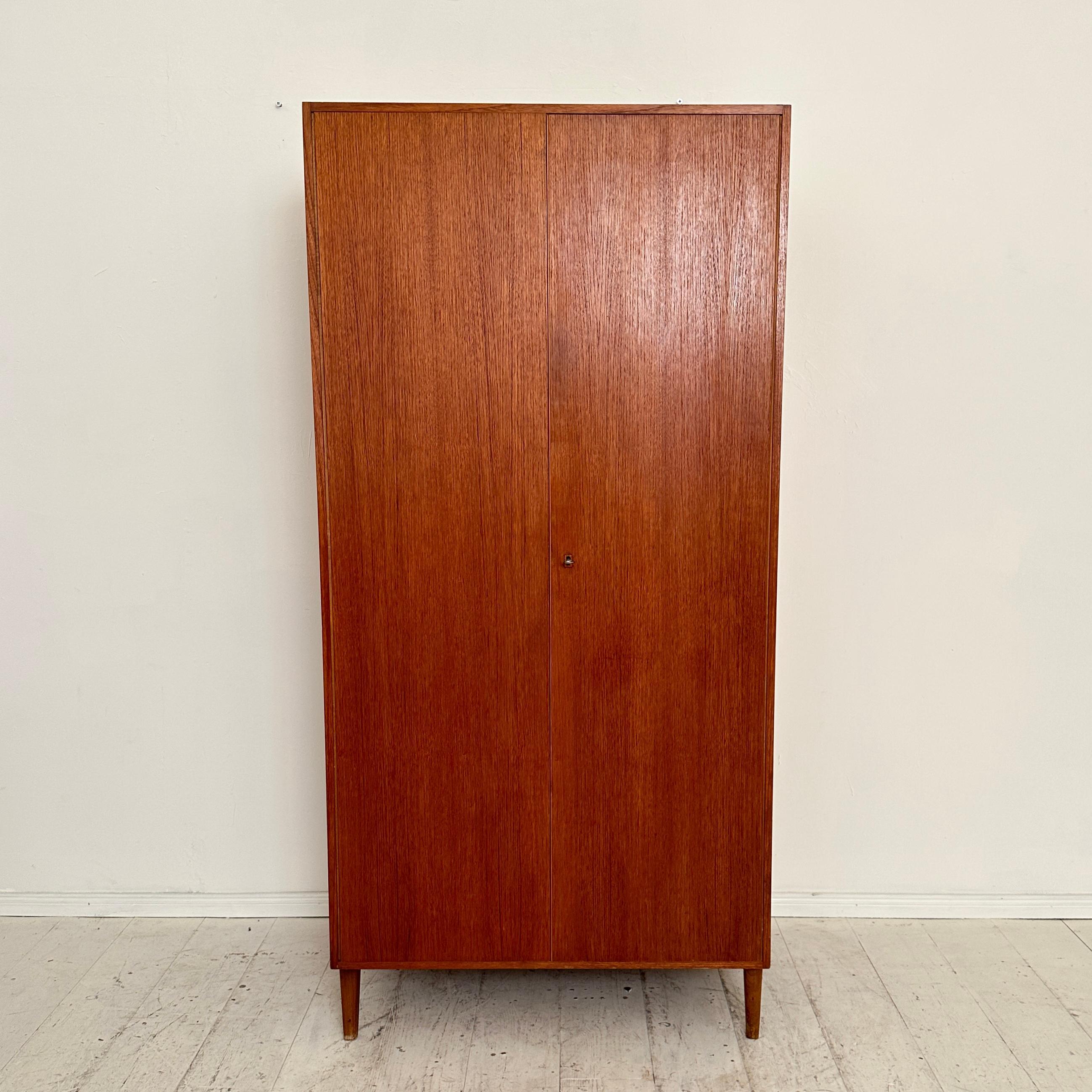 This great Mid Century Teak closet from the Deutsche Werkstätten was made around 1960. It is in very good vintage condition.
A unique piece which is a great eye-catcher for your antique, modern, space age or mid-century interior.
If you have any