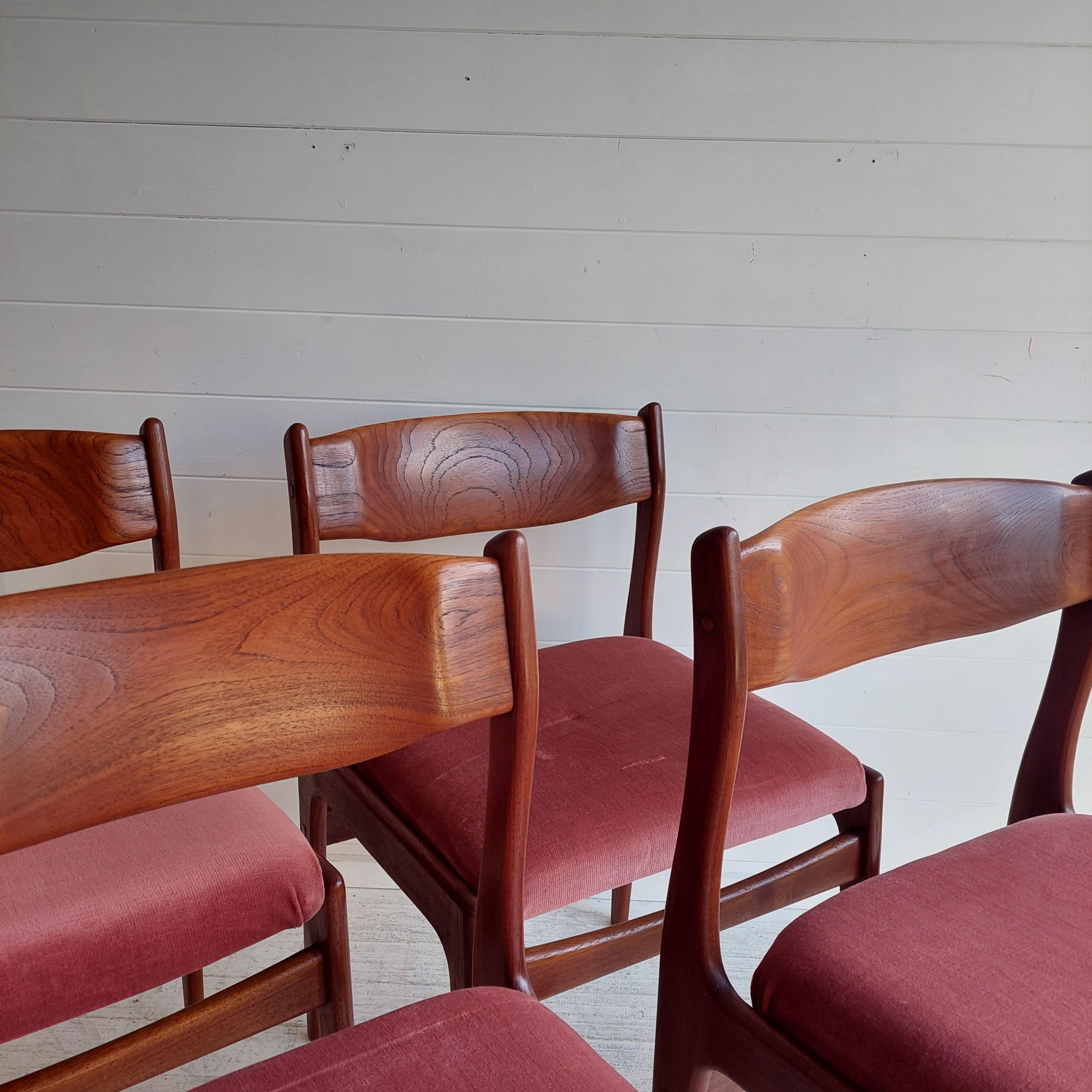 Indulge in the charm of mid-century Danish design with this set of 4 dining chairs
Erik Buch Style. 
These chairs were made in Denmark and date from around the early 1960s. 

Crafted from high-quality teak, these vintage retro chairs bring a touch