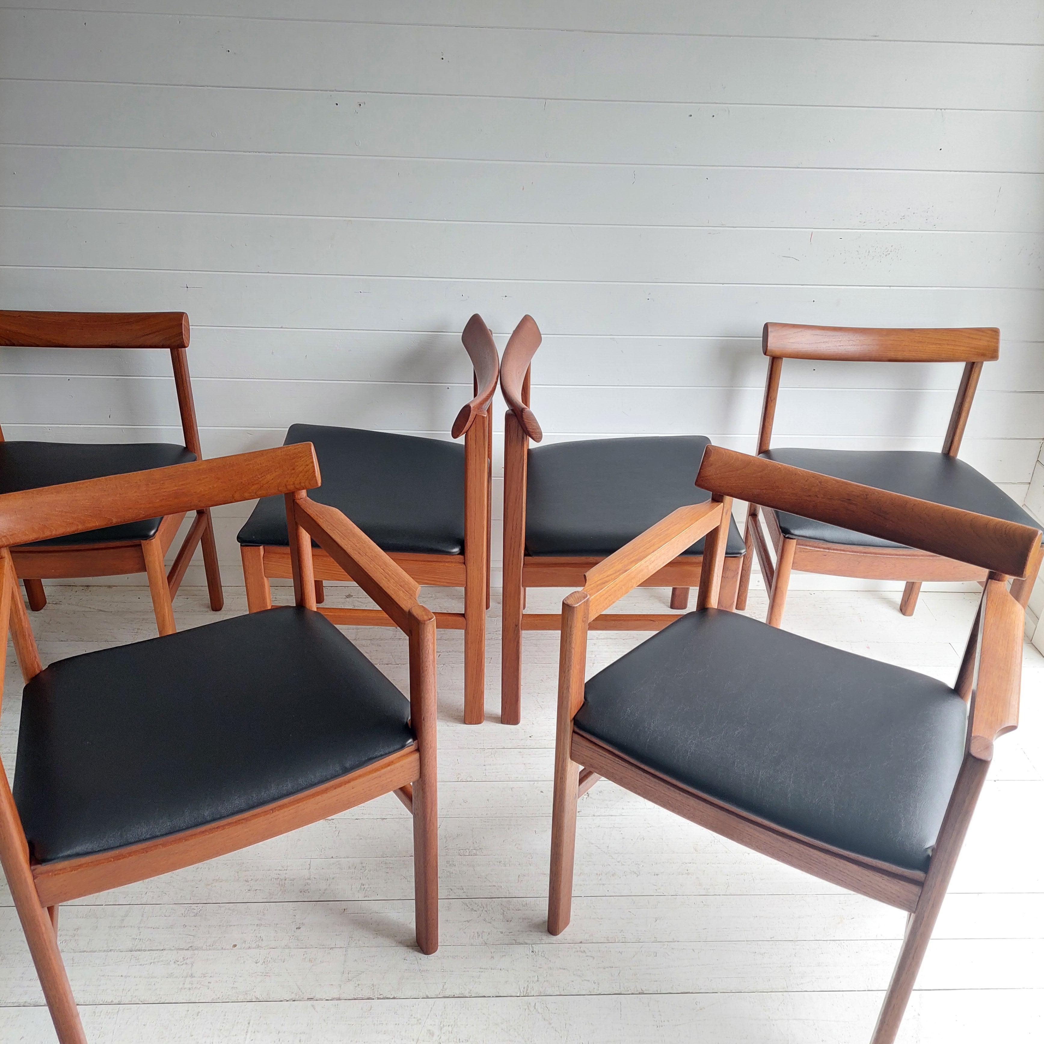Mid Century teak Danish dining chairs set of 6, 1960s
Elegant chairs with an interesting form. 
Six exceptional teak dining chairs including two carvers. 
They exude class with stunning lines.
In the manner of Farsö Stolefabrik

Lovely grain