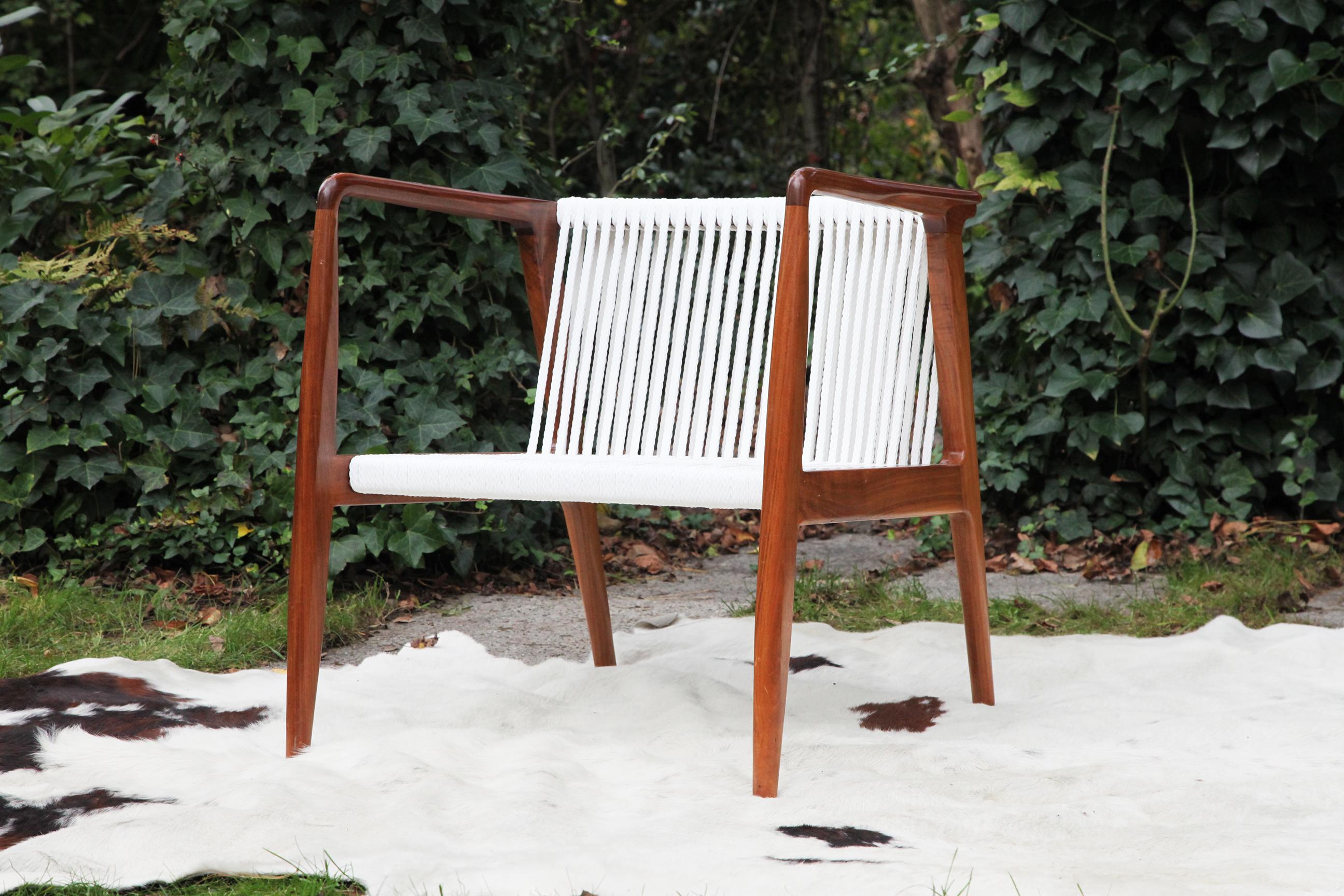 Available here is truly a rare, fantastic and iconic Danish style Walnut Mid Century Lounge Chair. It is an original vintage frame, that has been completely cleaned and beautifully restored. The Frame has had customized rope seating done for it.