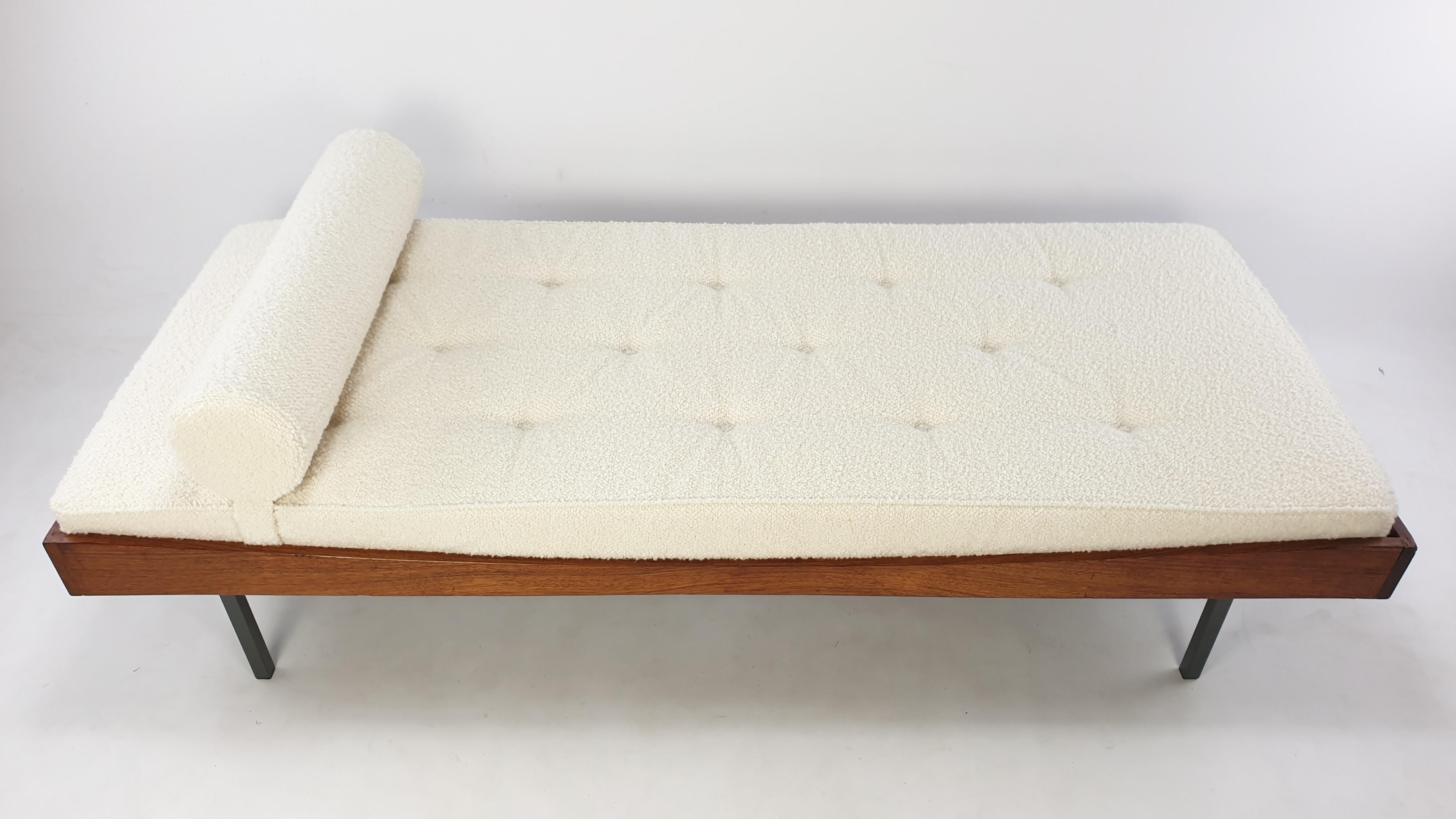 Very nice teak daybed, fabricated in The Netherlands in the 60's. Produced by Rawi Achilles. Very comfortable because of the high quality mesh springs. The mattress is renewed with new foam and it has just been upholstered with lovely wool bouclé