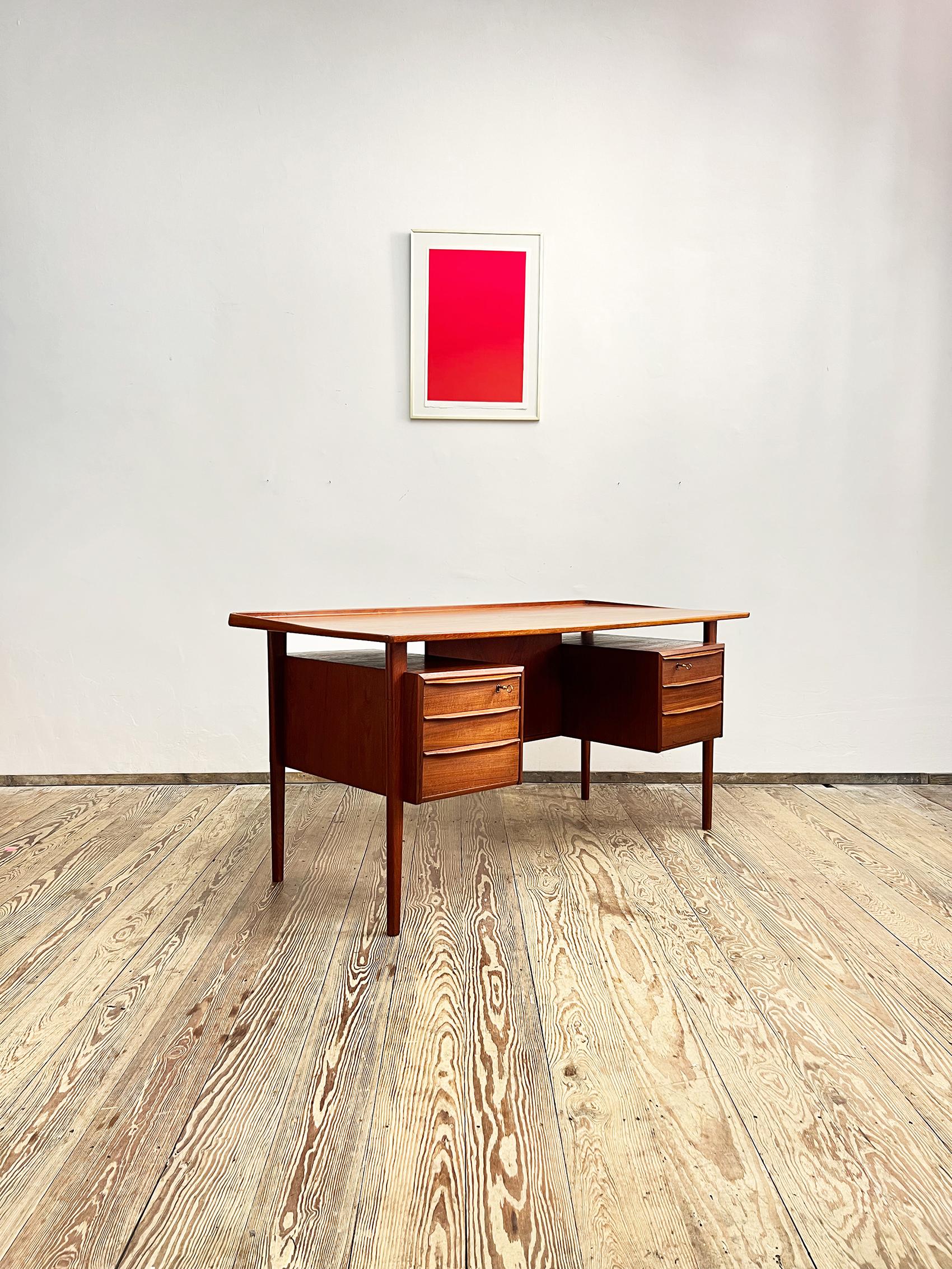 Dimensions 74 cm x 155 cm x 70 cm (Depth x Width x Height)


This free standing midcentury danish writing desk was designed by Peter Løvig Nielsen, produced by Hedensted Møbelfabrik Denmark in 1970. The table is made of teak wood and features two