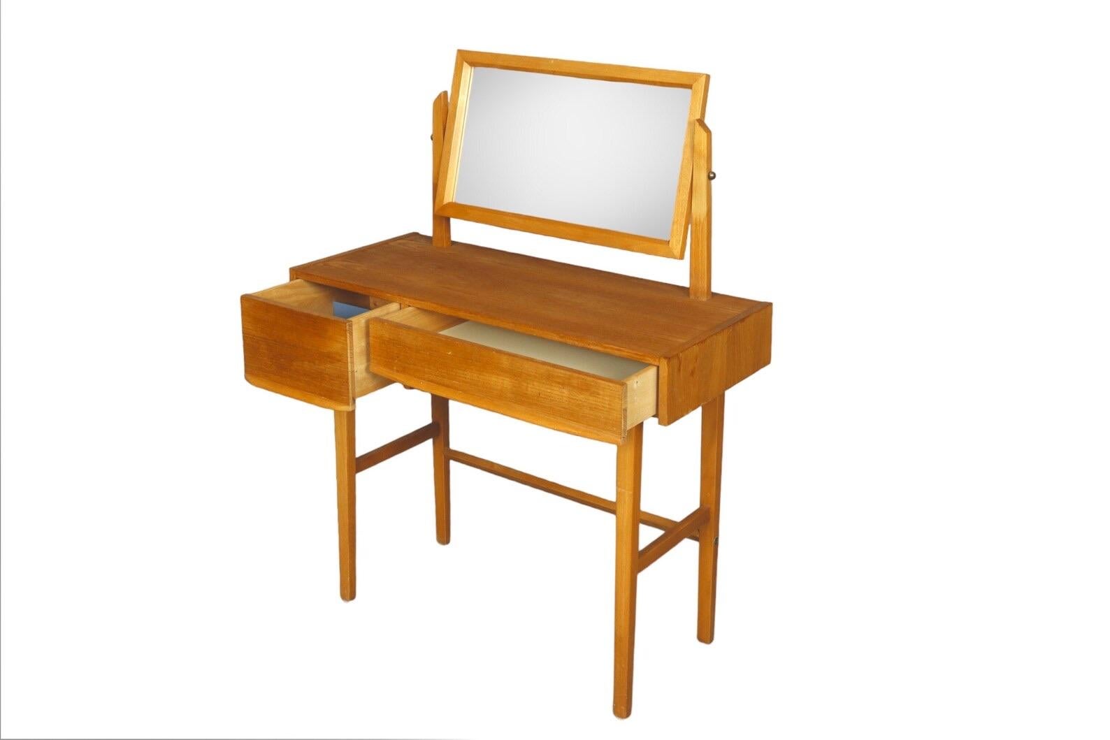Mid Century teak desk/vanity table with adjustable mirror 
in good condition considering age and use 
