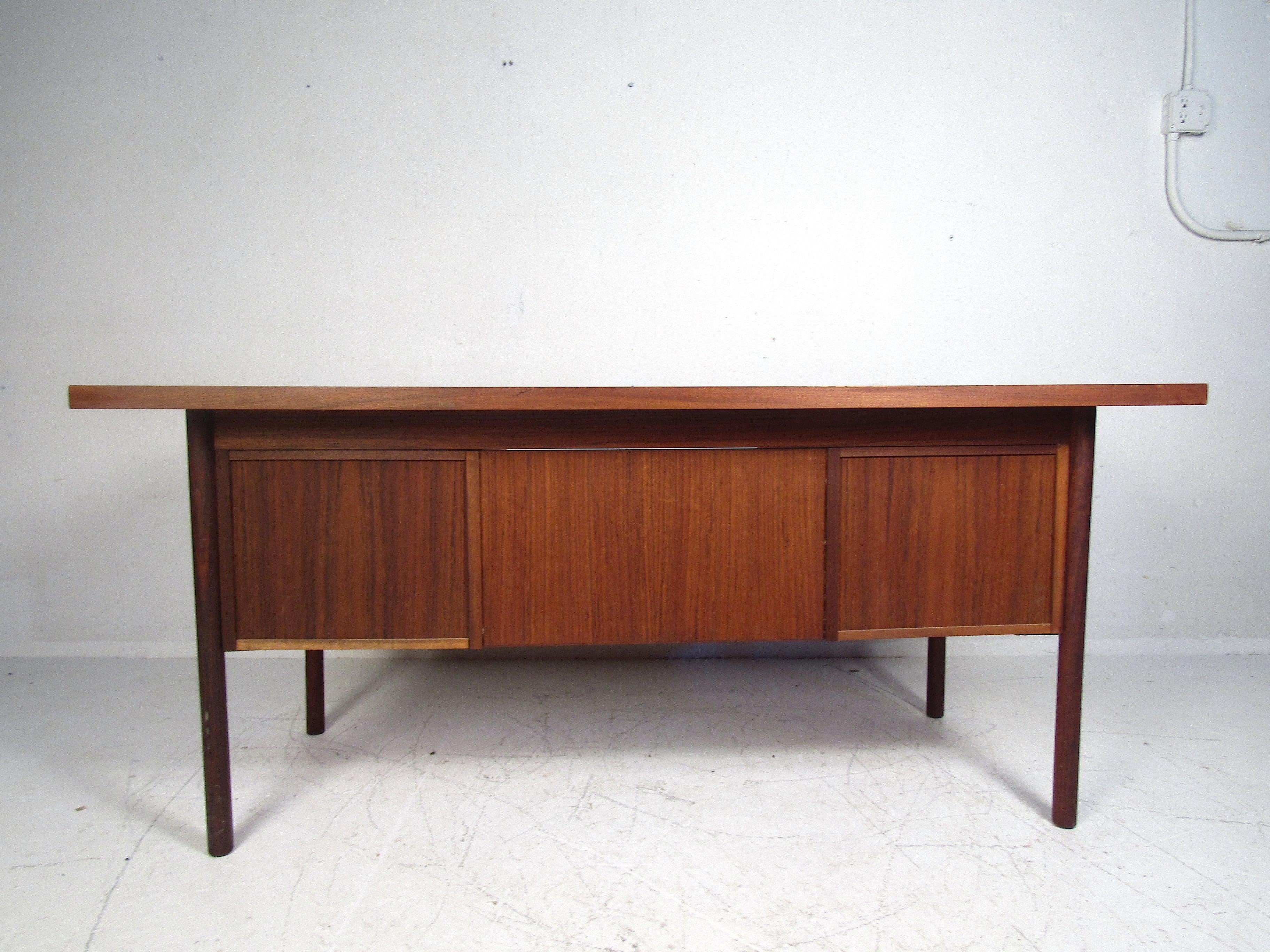20th Century Midcentury Teak Desk with a Finished Back For Sale