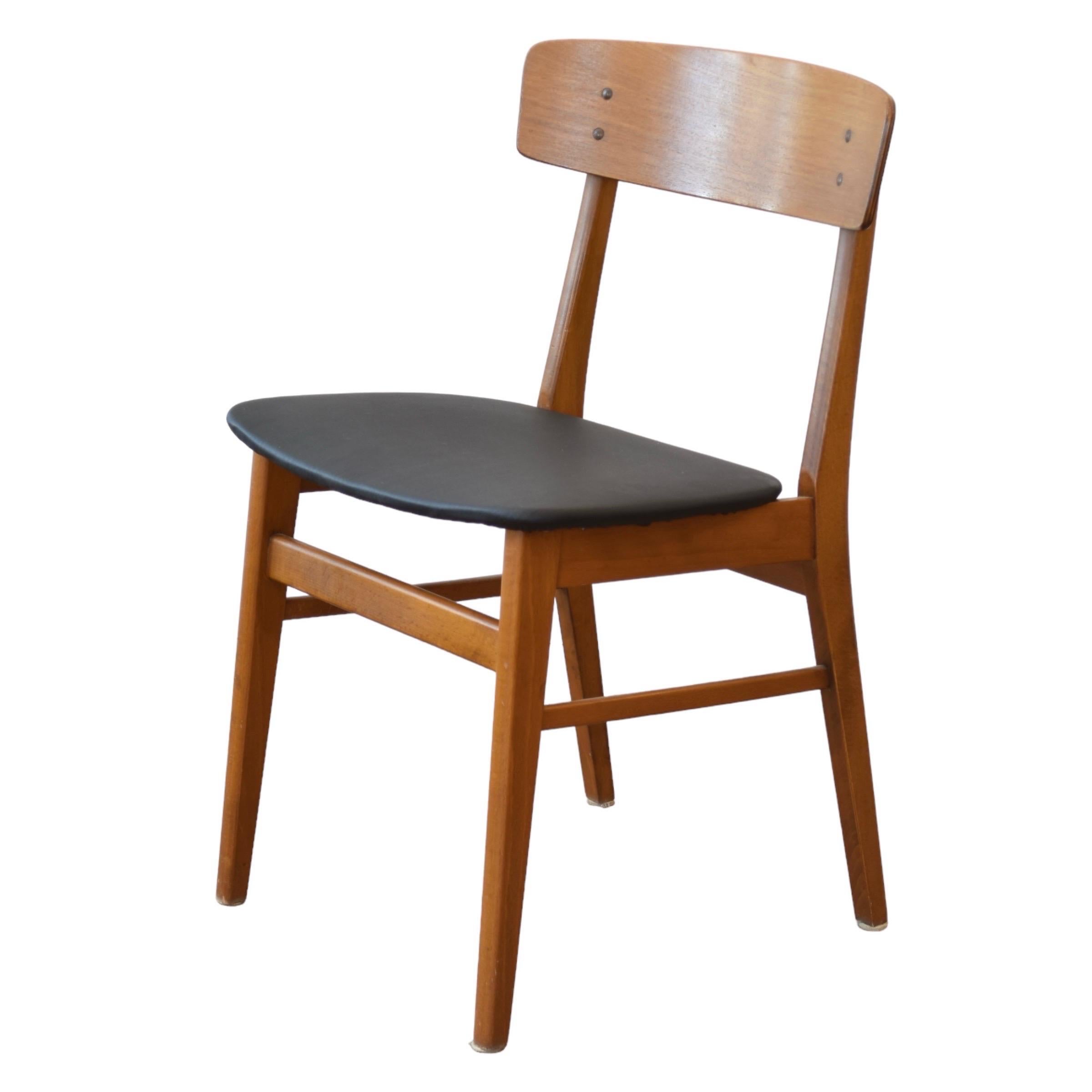 Condition: Great Vintage Condition - Freshly Reupholstered

Dimensions: 18.5” L x 19” D x 30.5” H (17.75” SH)

Description: A vintage set of 6 teak & beech dining chairs by Farstrup. Made in Denmark, circa 1960s. Freshly reupholstered in black