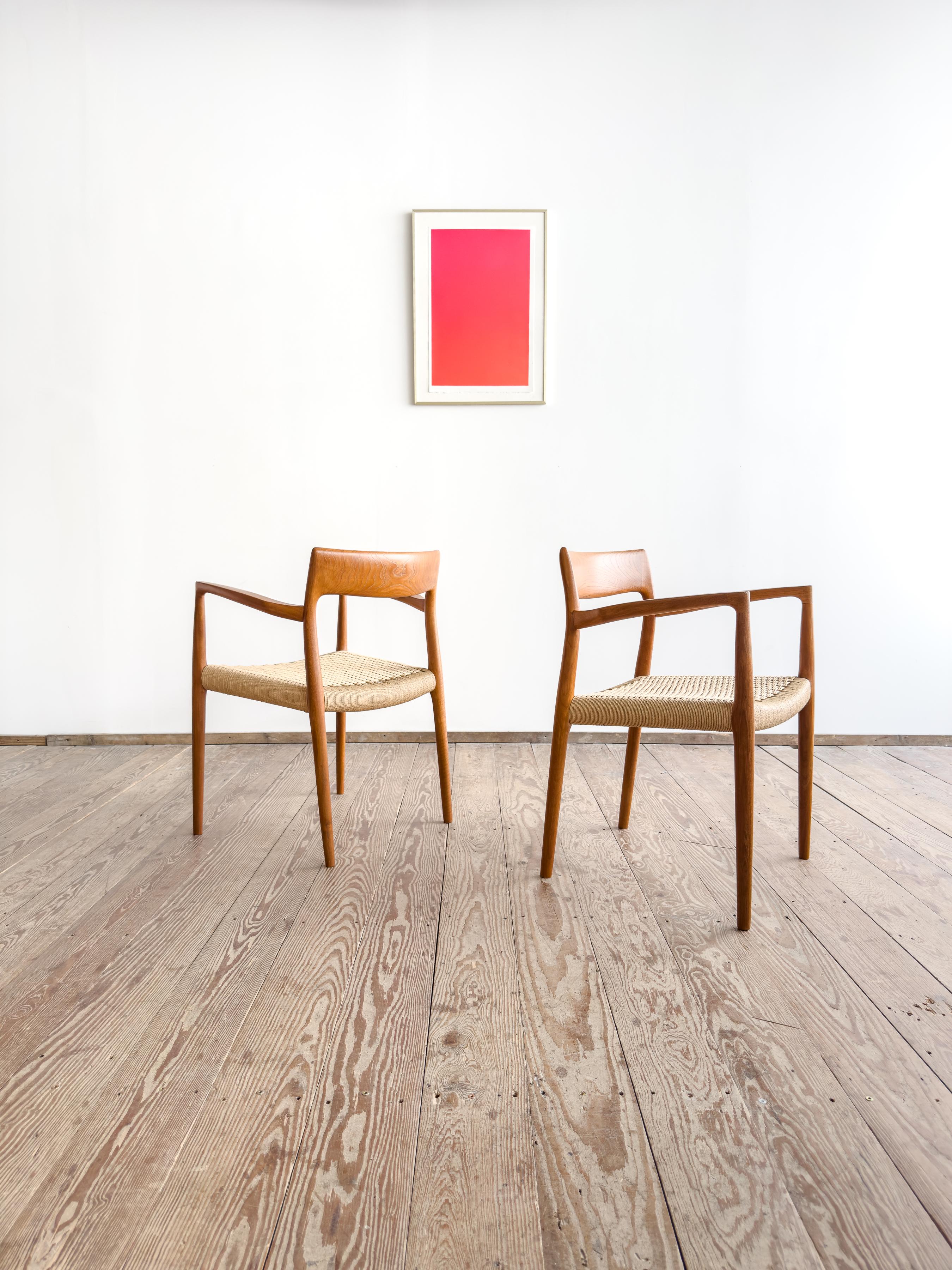 Dimensions: approx. 22 × 19.7 × 29.5 × 17.3 in (Width × Depth × Height, Seat height)

Original pair of dining chairs by Niels O. Møller, produced by J.L. Møllers Møbelfabrik in Denmark. Model 57 is among his most elegant and sculptural designs — a