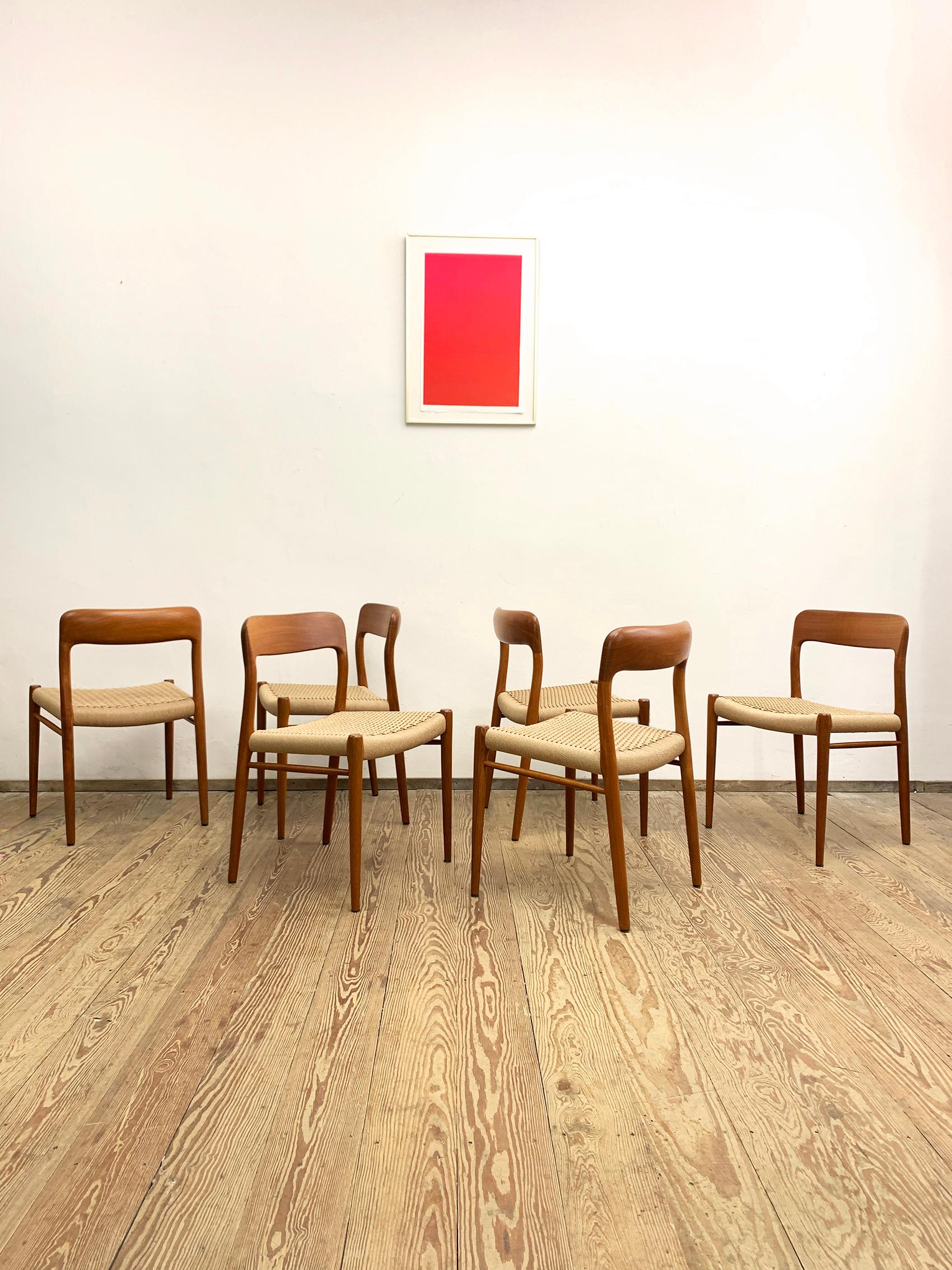 Dimensions: Height: 29.53 in. (75 cm), Width: 19.69 in. (50 cm), Depth: 18.51 in. (47 cm)

This beautiful set of danish dining chairs designed by Niels O. Møller in the 1950s was manufactured by J.L. Møllers in Denmark. The set features 6 chairs of