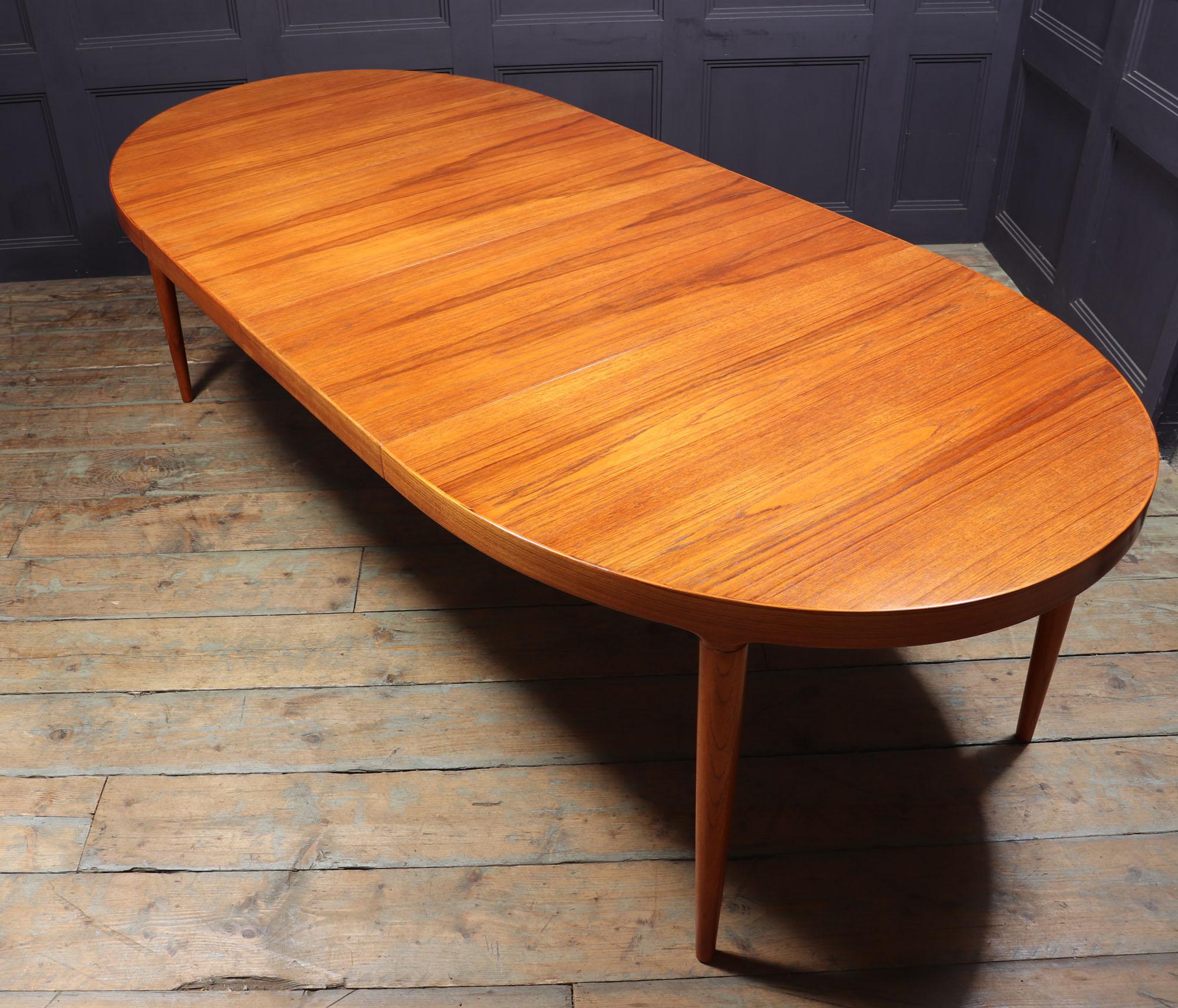 Mid century Teak Dining Table by Johannes Anderson 4