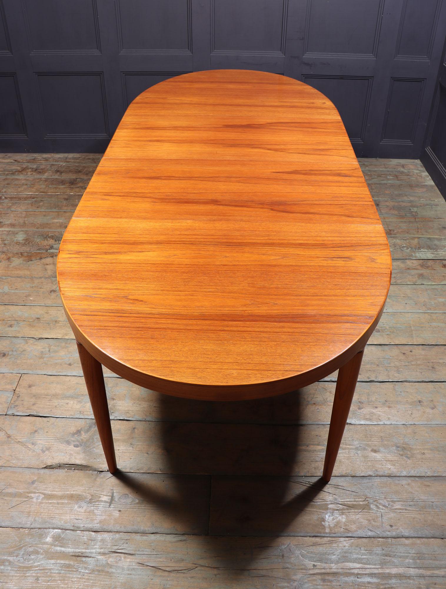 Mid century Teak Dining Table by Johannes Anderson 1