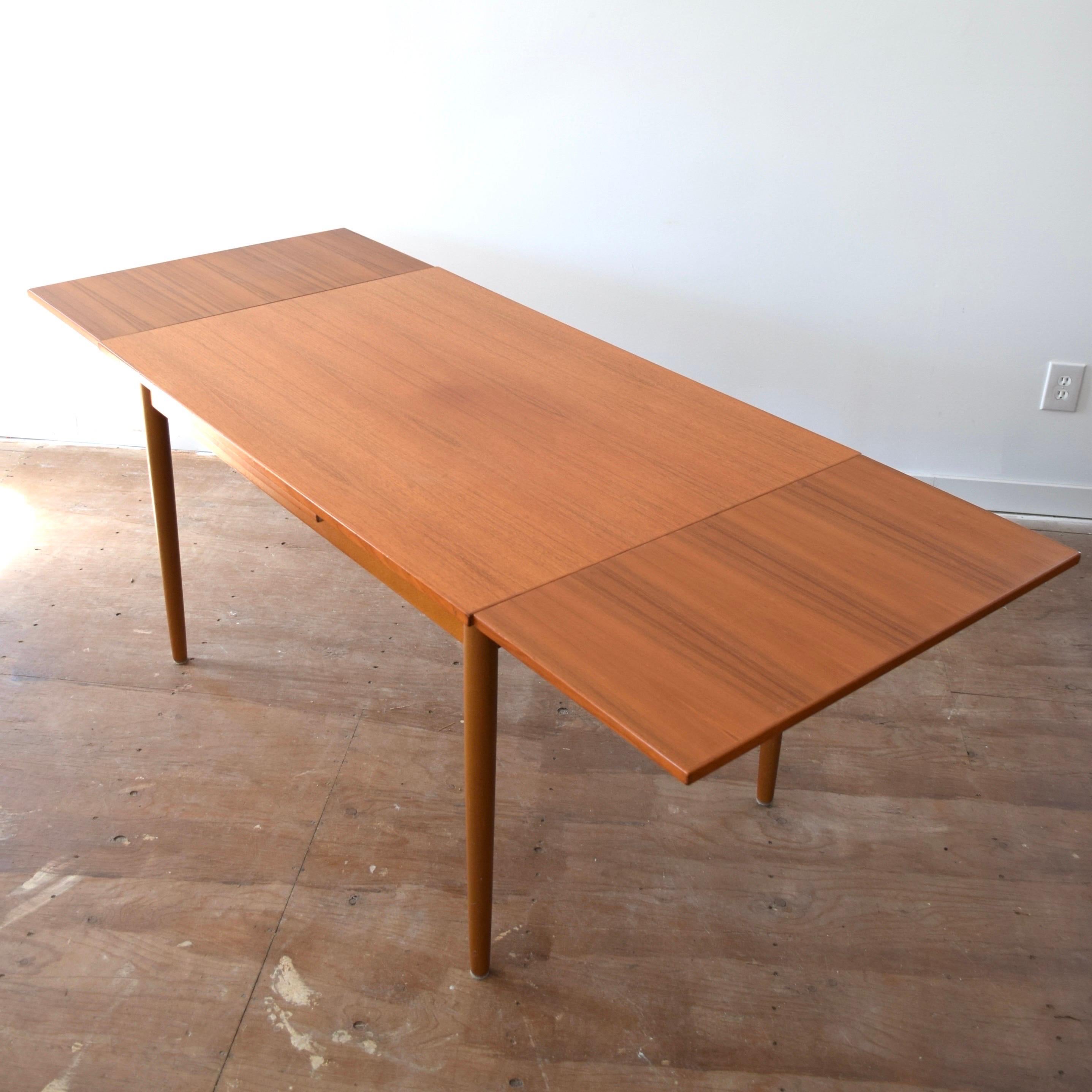 Danish Mid Century Teak Draw Leaf Dining Table by Farstrup For Sale