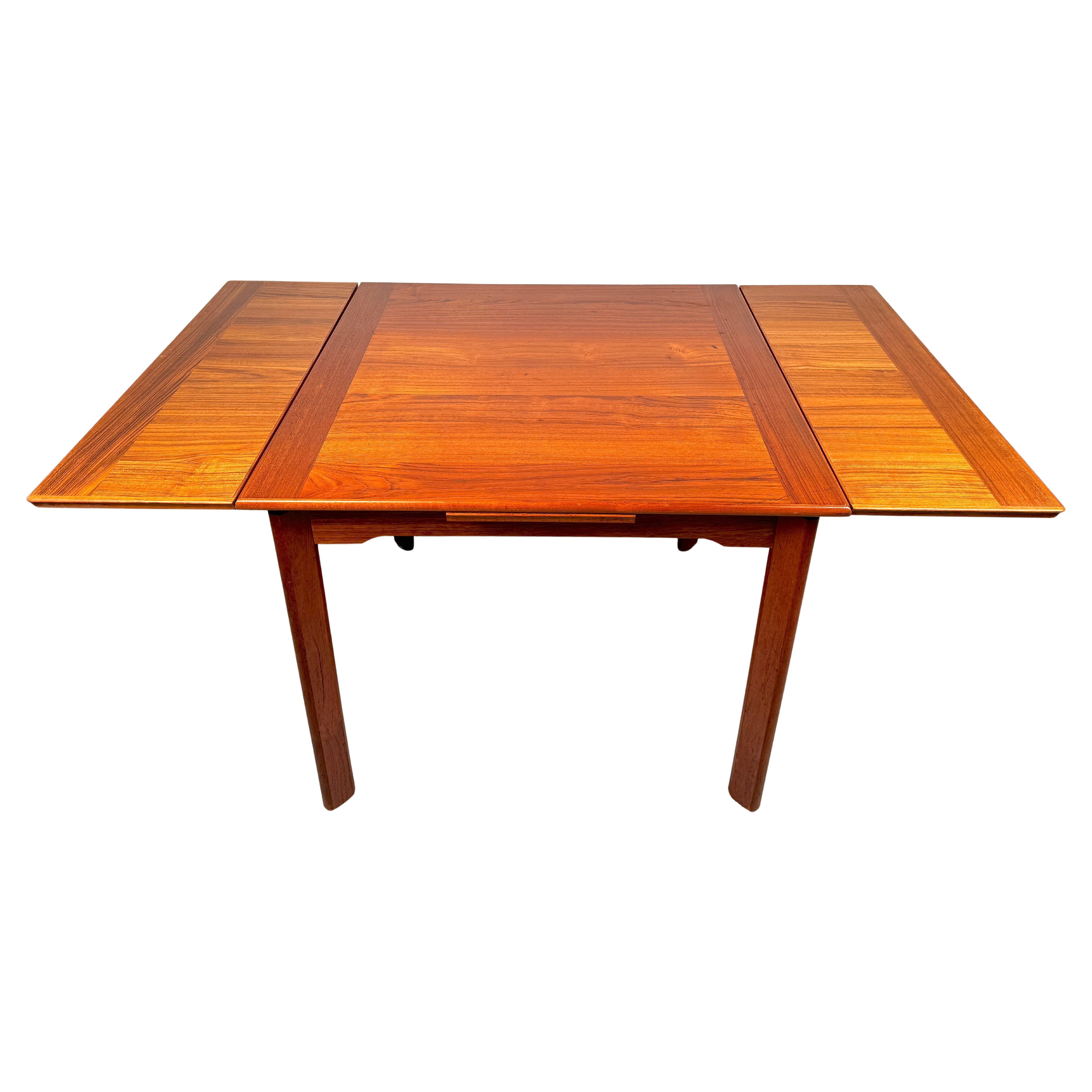 Mid-Century Teak Draw Leaf Table Made in Denmark For Sale