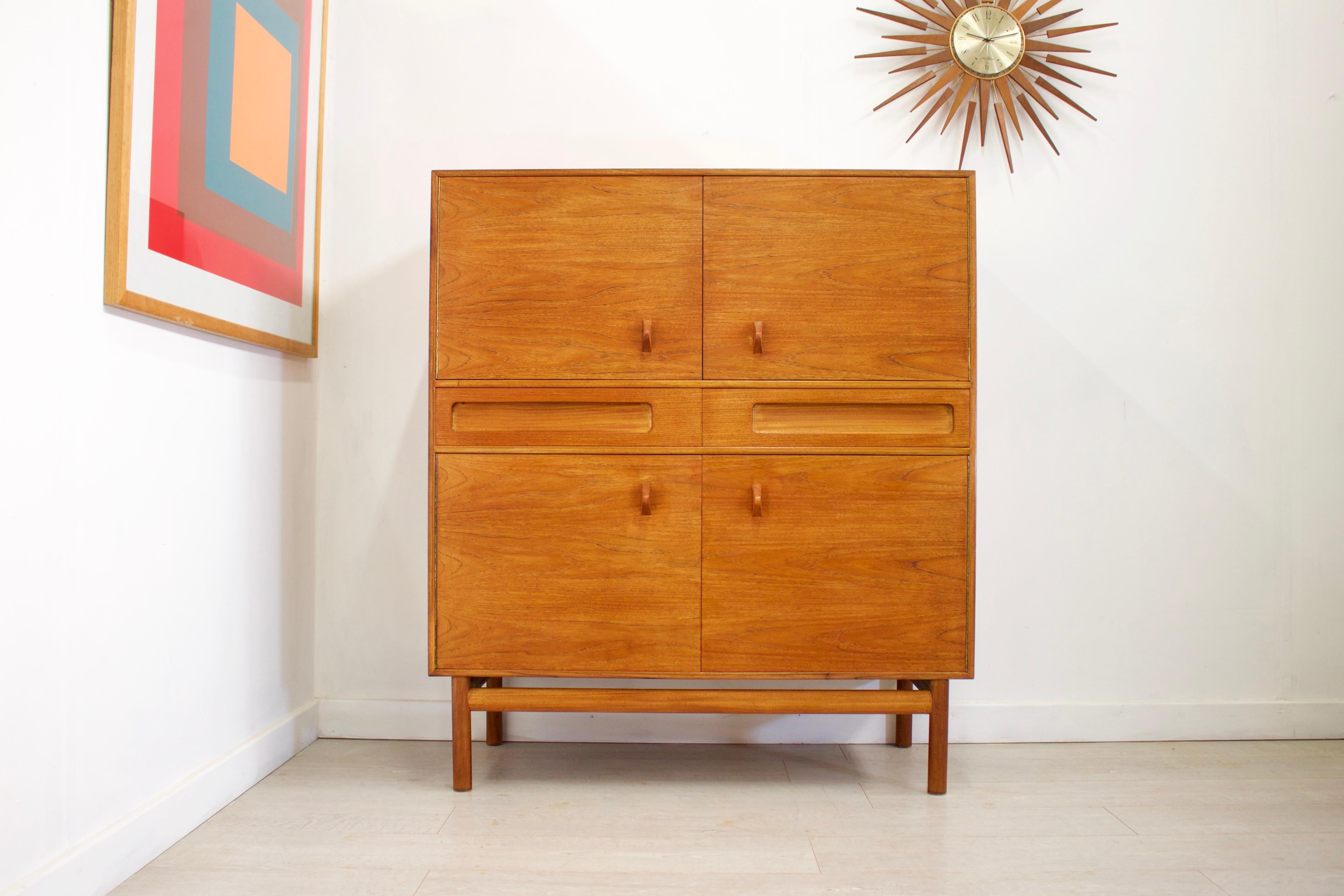 Midcentury design

- Midcentury drinks cabinet / dry bar / sideboard
- Manufactured in the UK by McIntosh
- Made from teak and teak veneer.