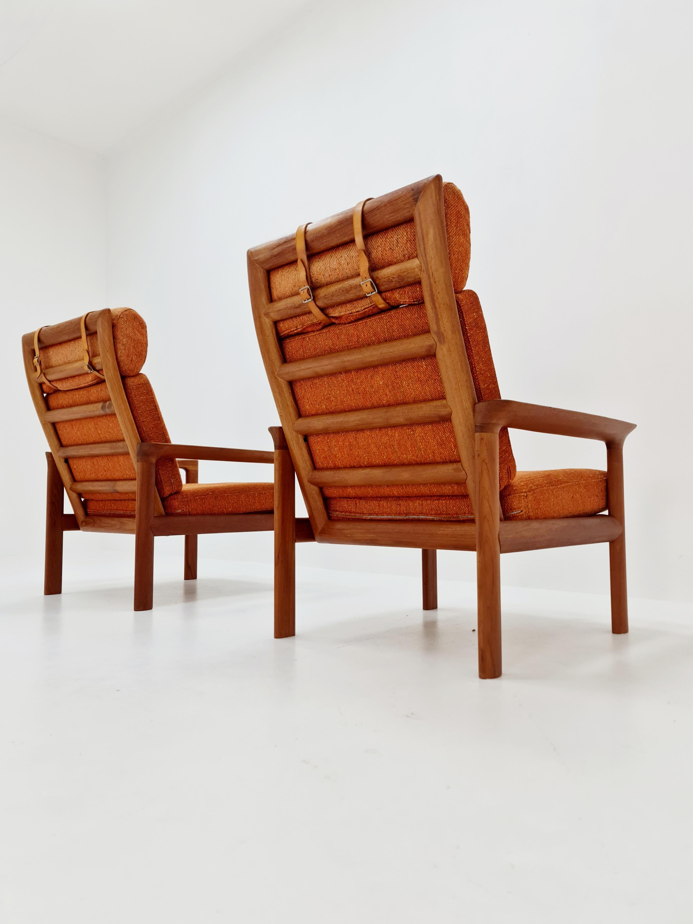 Danish Mid century teak easy lounge high back chairs by Sven Ellekaer for Komfort  For Sale