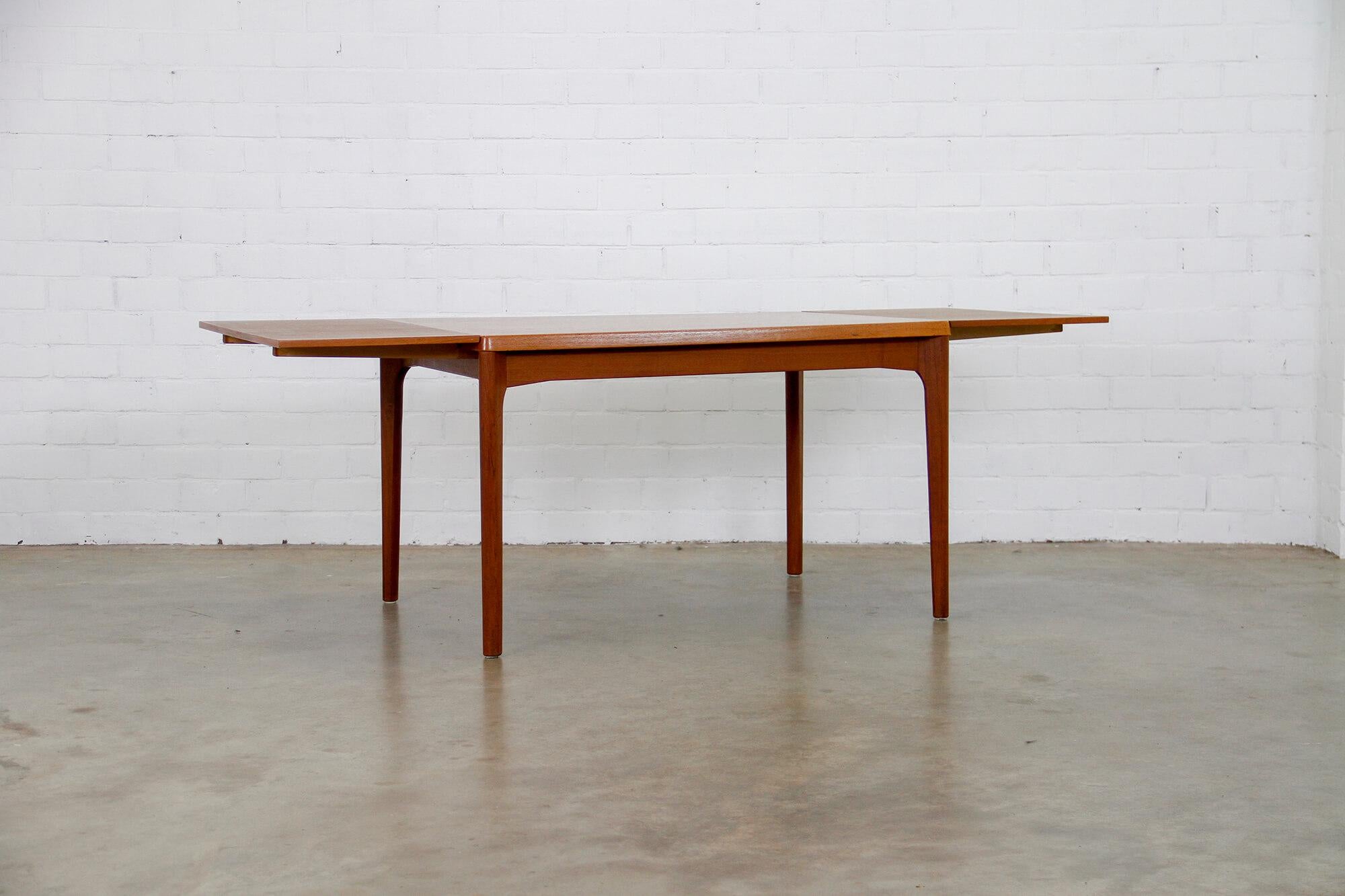 Vintage Danish extendable dining table designed in the 1960s by Henning Kjærnulf for Vejle Stole Møbelfabrik. The table is in very good condition and marked.