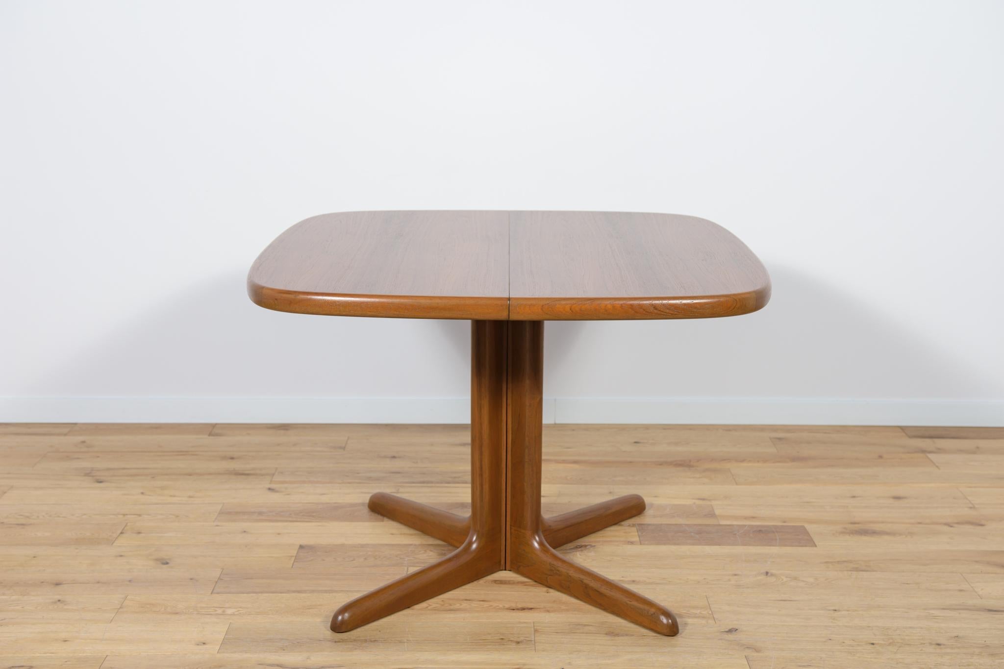 This teak dining table was Danish manufactured by Skovby Mobelfabrik in the 1960s. The table has profiled edges, giving it elegance and a unique character. The furniture has been thoroughly renovated, cleaned of old coating, painted with oak stain,
