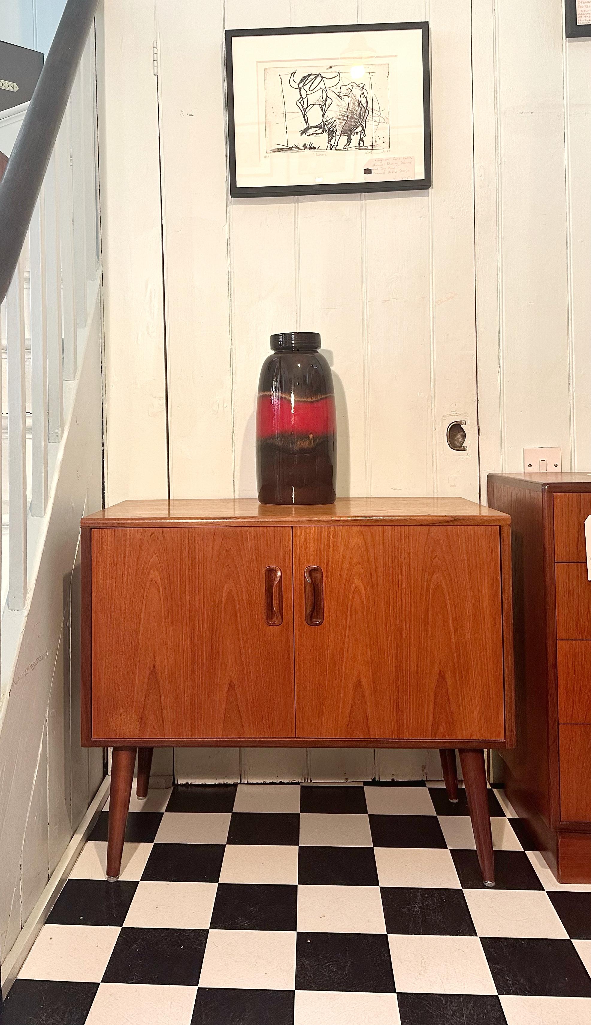 Beautiful G Plan Fresco mid century modern vinyl/record/storage cabinet. 
Beautiful teak finish, with stylish tapered legs. 
Features one adjustable/removable shelf inside a spacious cupboard.
Beautiful piece which offers plenty of storage. Very