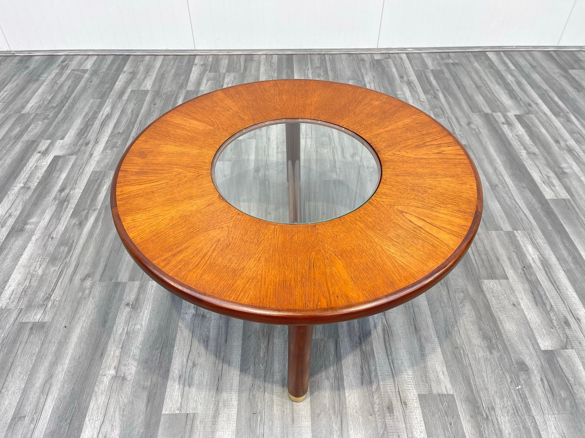 This round stained teak and glass coffee table was manufactured by G-Plan, and was produced in England in the 1970s. A real touch of Boho Chic about this one!

Structurally sound with brand new, unscratched glass in the centre of the