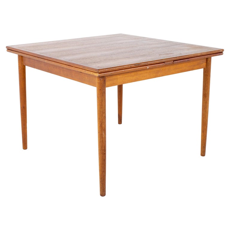 Mid Century Teak Hidden Leaf Expanding Dining Table at 1stDibs