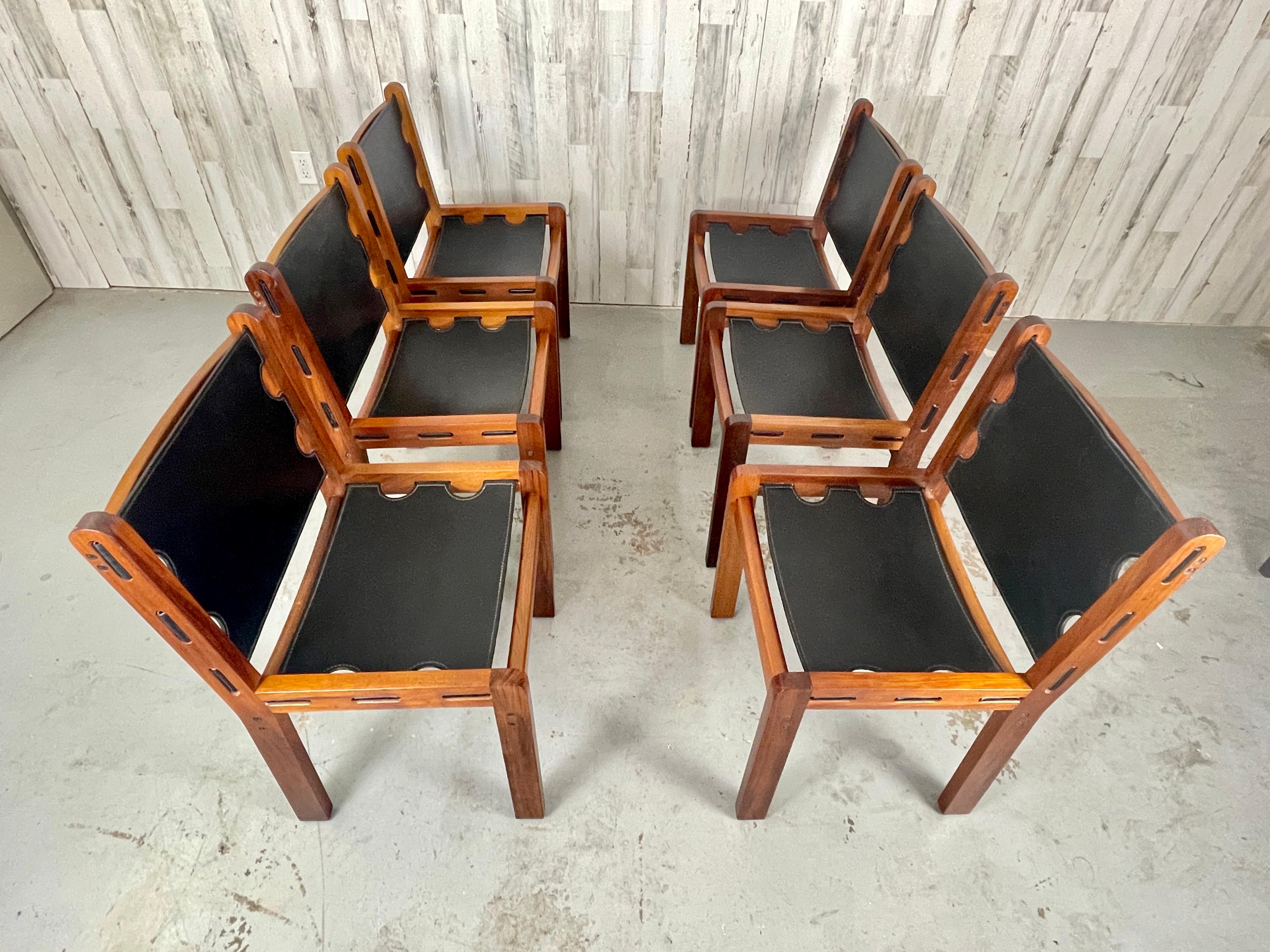 Very sturdy solid teak with heavy black leather sling seat and back makes for an very comfortable seating
Made in Australia 1974 with the Victorian Guild label underneath.