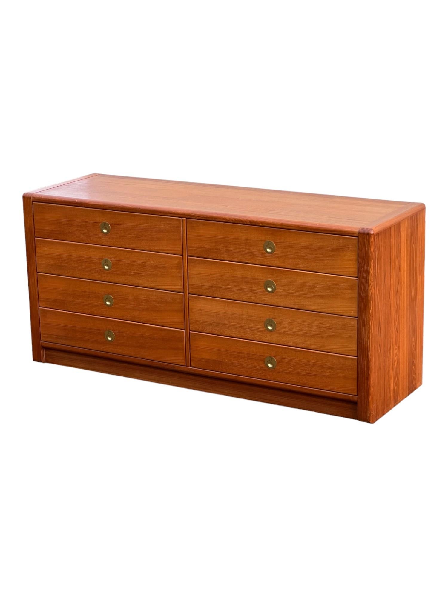 Mid-Century Teak Lowboy Dresser by D-Scan in pristine condition. 

Dimensions: 

width - 62.5”

depth - 20”

height - 29.5”