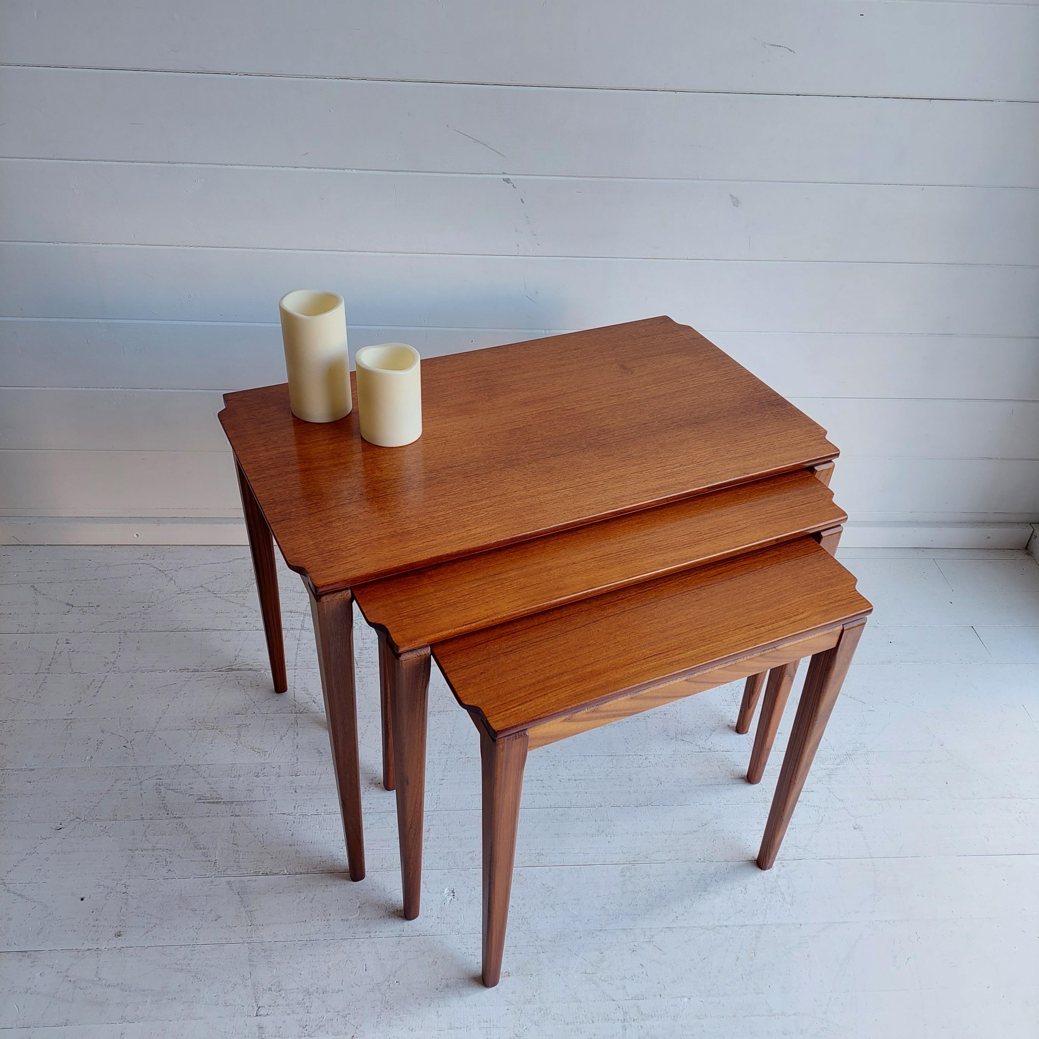 This set of tables were designed by Richard Hornby circa 1960s. His elegantly crafted furniture was manufactured by Fyne Ladye Furniture of Bath, UK.

The tables are made of Afromosia. Featuring Hornby signature recessed wood on the