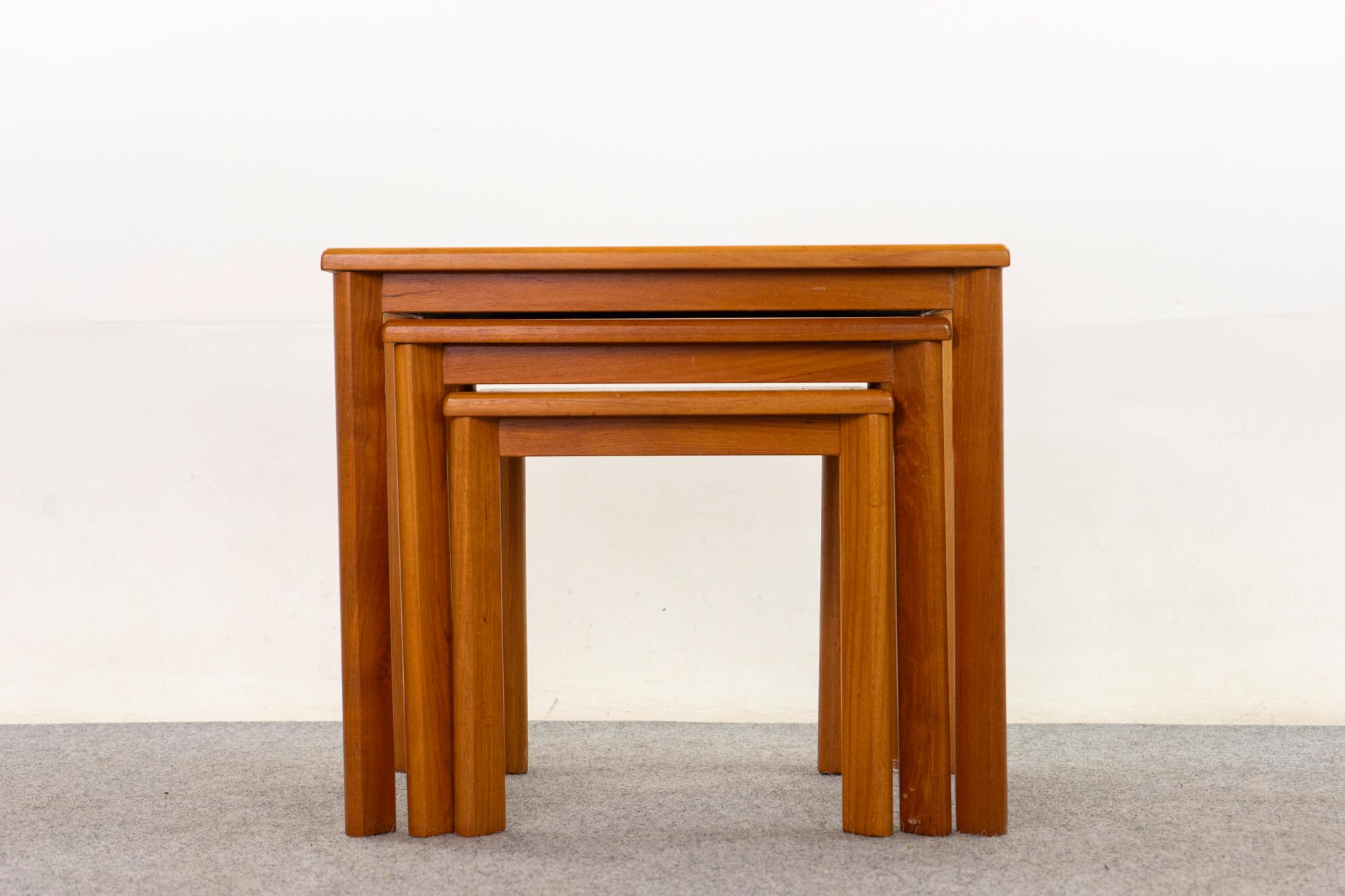 Teak mid-century nesting tables, circa 1970s. Robust construction and simple lines. Space-saving design, the footprint of 1 table with the functionality of 3!

Unrestored item with option to purchase in restored condition for an additional $200 USD.
