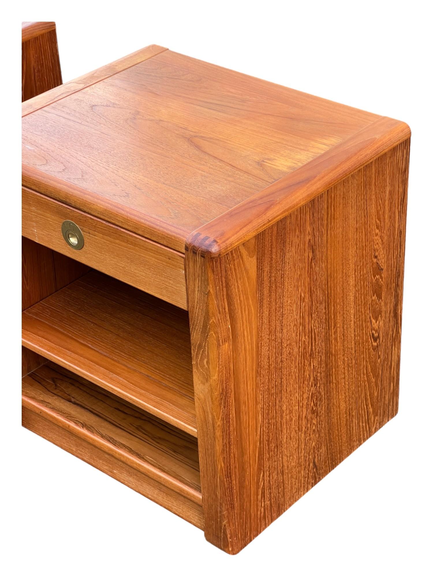 Check our profile for the matching dresser! 

Mid-Century Teak Nightstands by D-Scan in good condition with one having wear on one side, and the other having a white scuff on the top. (all flaws pictured)

Dimensions:

width - 24”

depth -