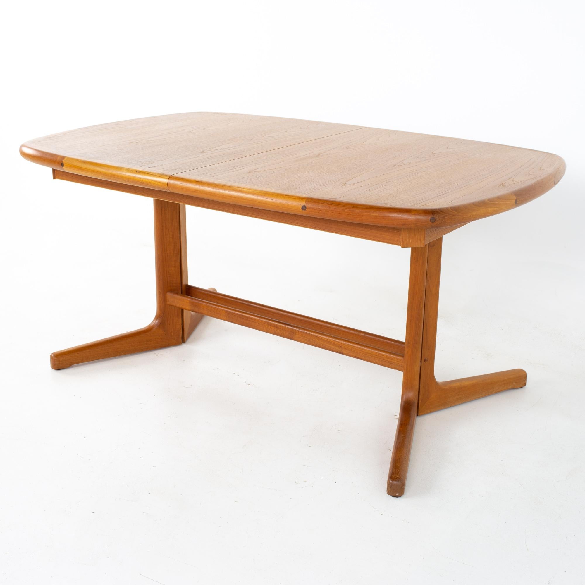Mid century teak oval expanding dining table
Table measures: 58.75 wide x 38.25 deep x 28.25 inches high; each leaf is 19 inches wide, making a maximum table width of 96.75 inches when both leaves are used

All pieces of furniture can be had in