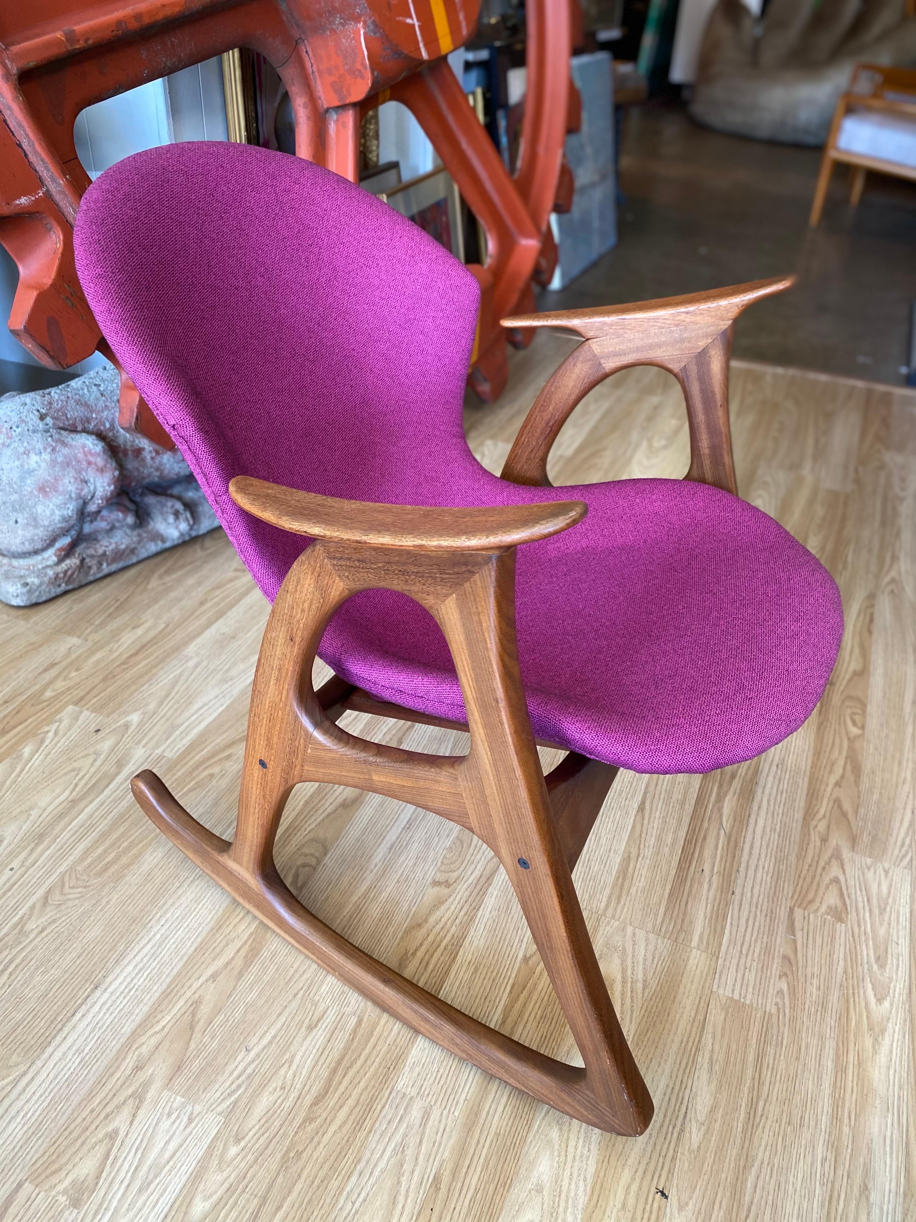Beautiful Danish modern teak rocking chair by Aage Christiansen has been professionally reupholstered with Knoll fabric and is in great vintage condition. Denmark, 1960s.