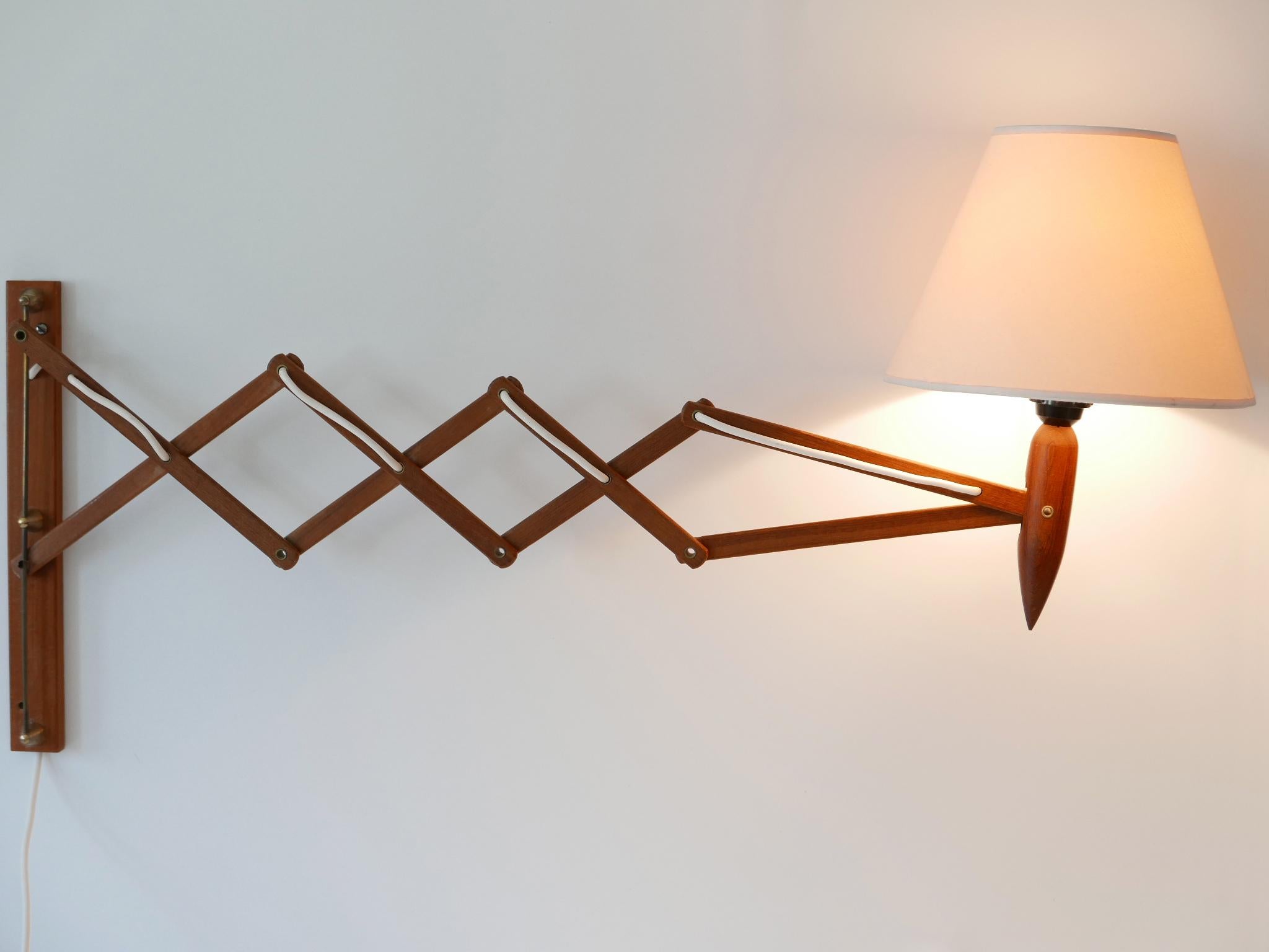 Danish Mid Century Teak Scissor Wall Lamp by Erik Hansen for Le Klint Demark 1960s For Sale