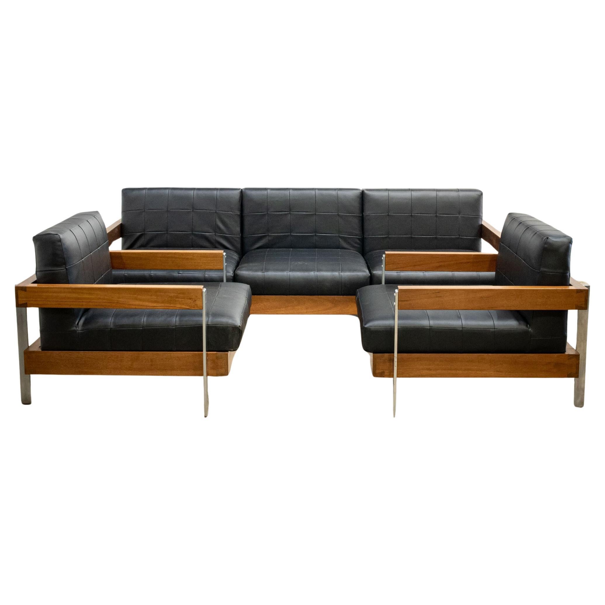 Mid Century Teak Settee 
Pair of Armchairs For Sale