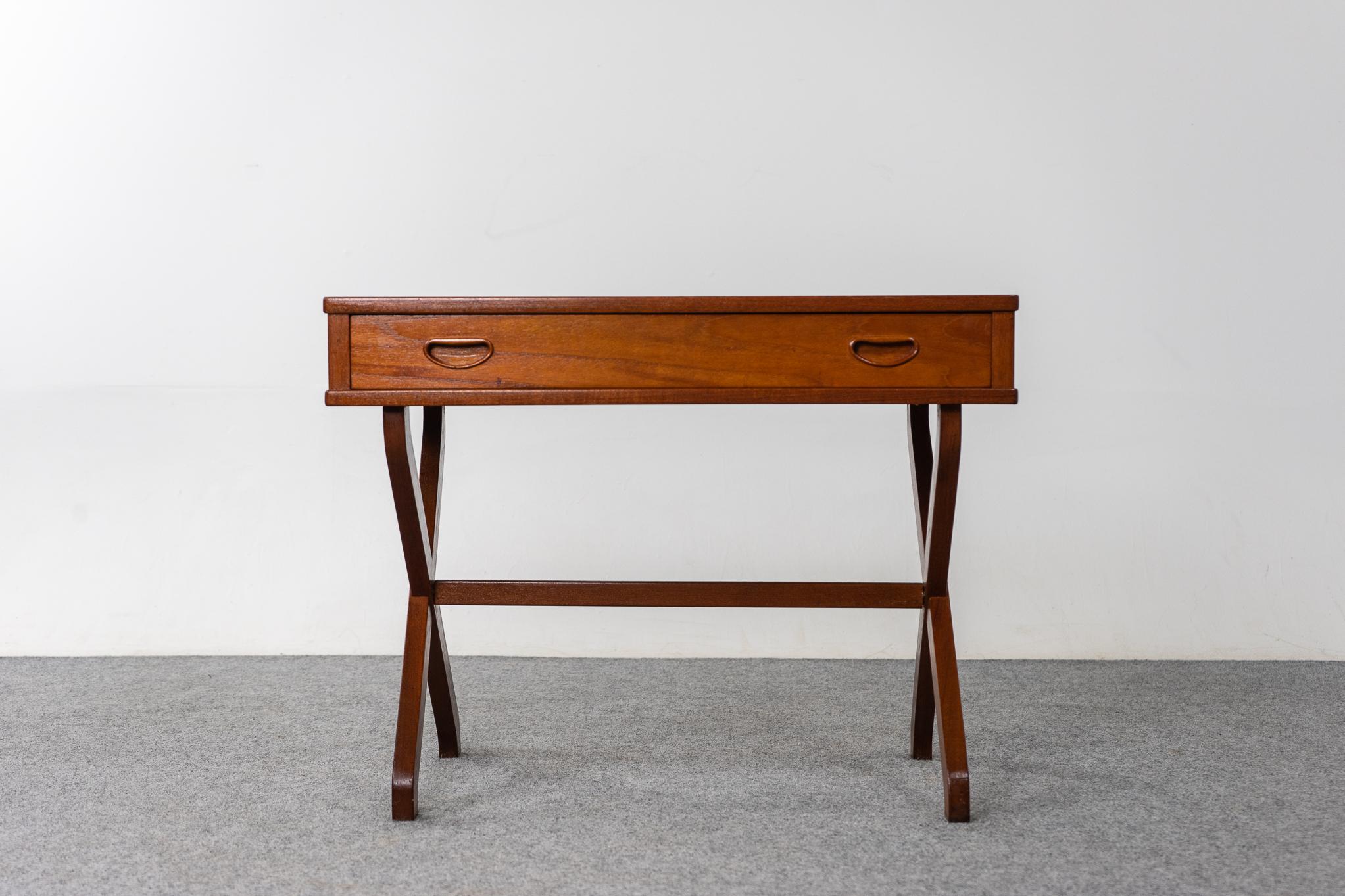 Teak Danish sewing/side table table, circa 1960's. Slim, elegant table with charming X legs and support bar. Lovely 