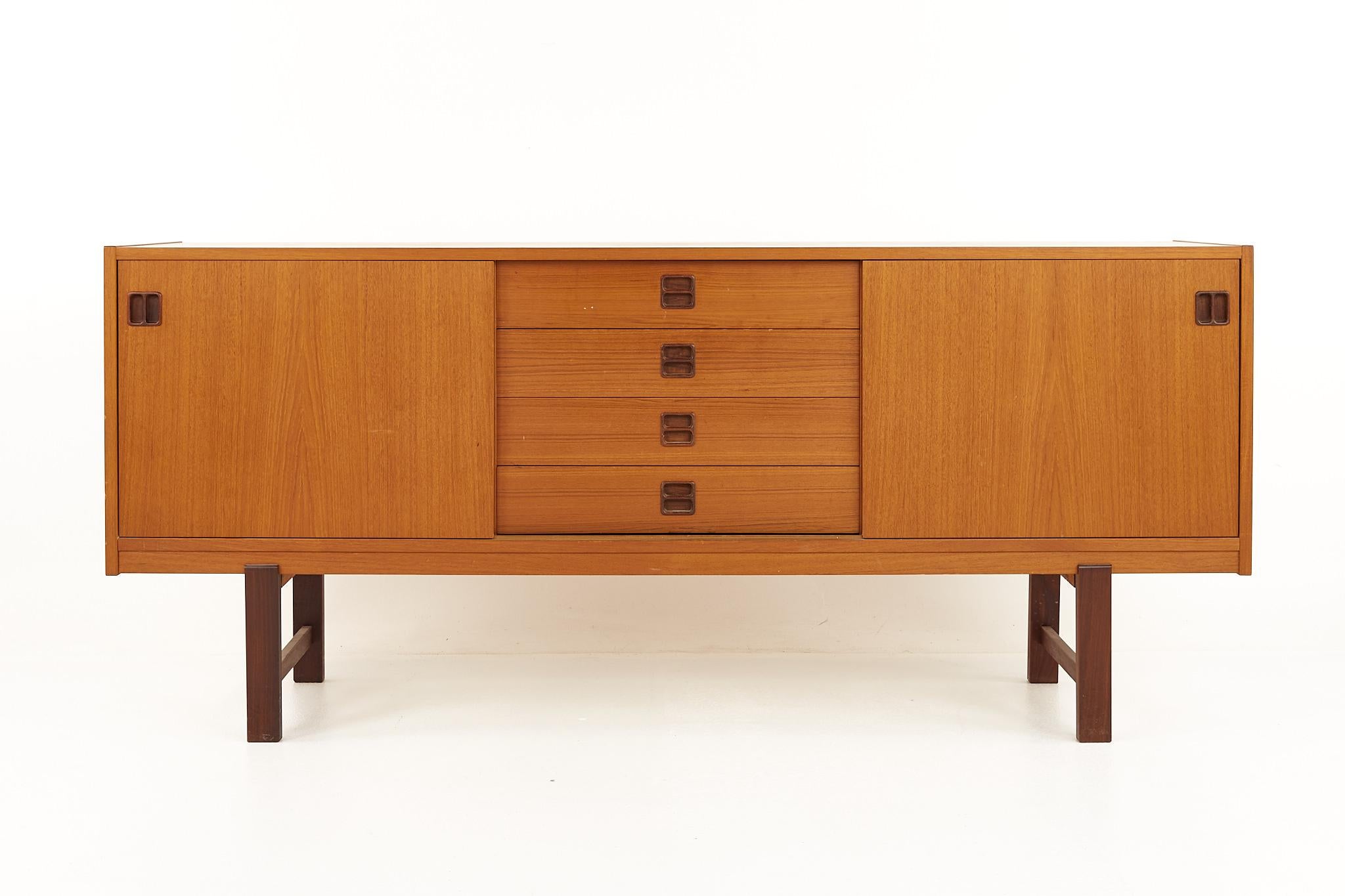 Mid century teak sideboard credenza

This credenza measures: 66.75 wide x 16.5 deep x 29 inches high

All pieces of furniture can be had in what we call restored vintage condition. That means the piece is restored upon purchase so it’s free of