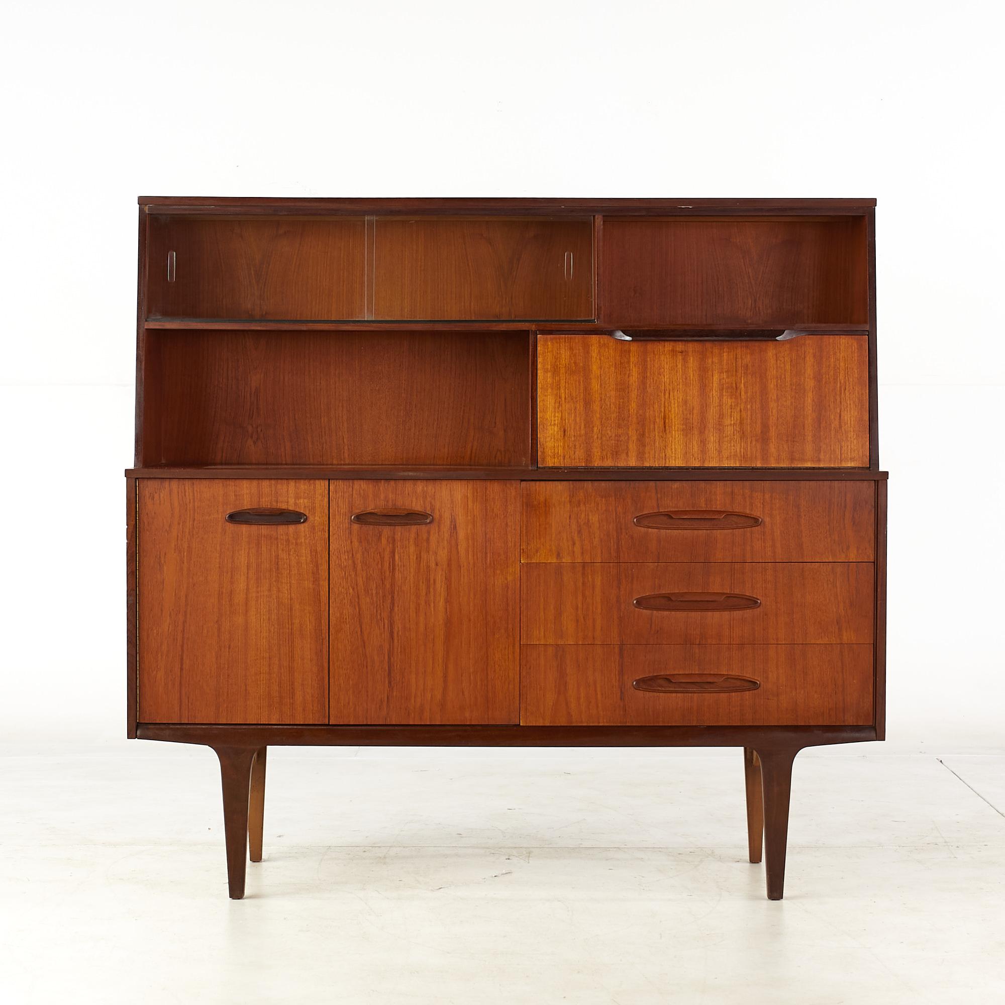 Mid Century teak sideboard

This sideboard measures: 54 wide x 16.25 deep x 50.25 inches high

All pieces of furniture can be had in what we call restored vintage condition. That means the piece is restored upon purchase so it’s free of