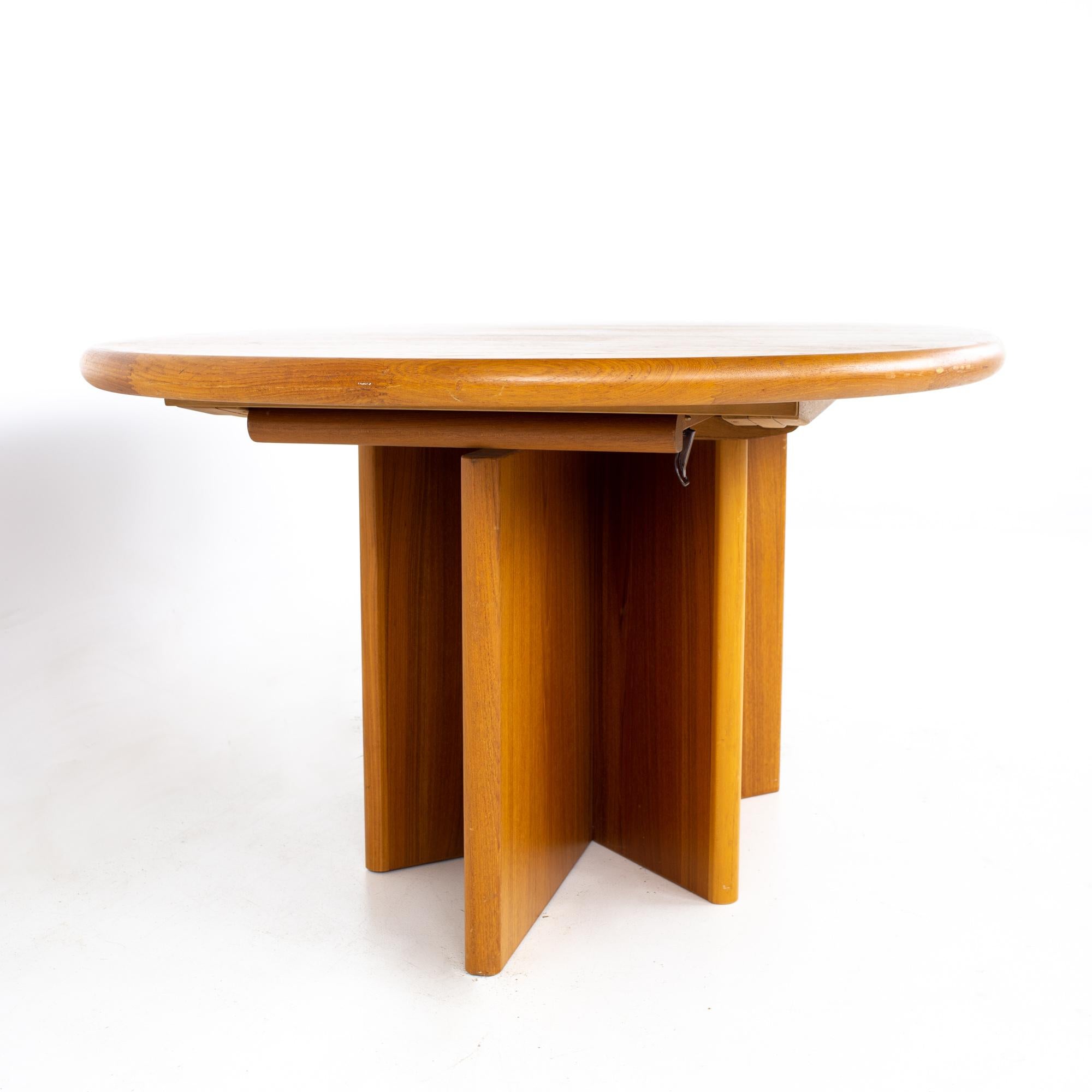 Danish Mid Century Teak Starburst Pedestal Expanding Hidden Leaf Dining Table