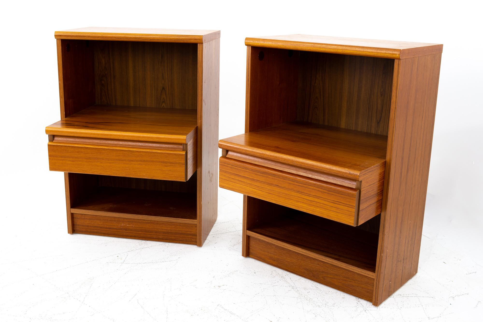 Mid century teak step nightstands - pair
Each nightstand measures: 20 wide x 16.75 deep x 28.75 high

All pieces of furniture can be had in what we call restored vintage condition. That means the piece is restored upon purchase so it’s free of