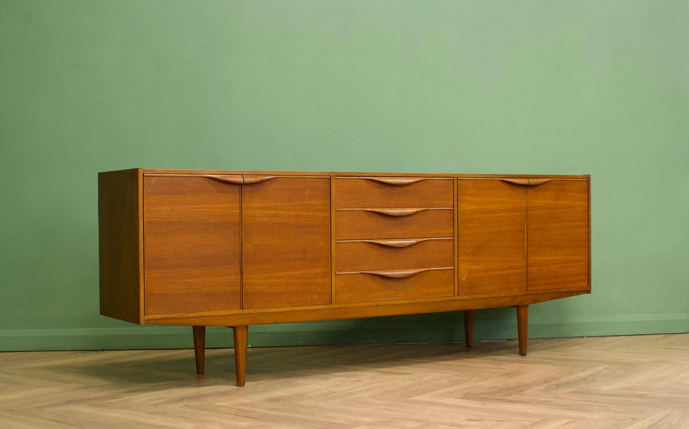 A mid century Swedish teak sideboard from AB Seffle Mobelfabrik, circa 1960s

Featuring 4 drawers, 2 cupboards and solid teak handles and legs