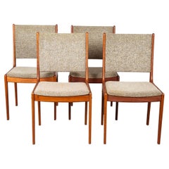 Sedie da pranzo con schienale alto in teak del metà secolo Quattro