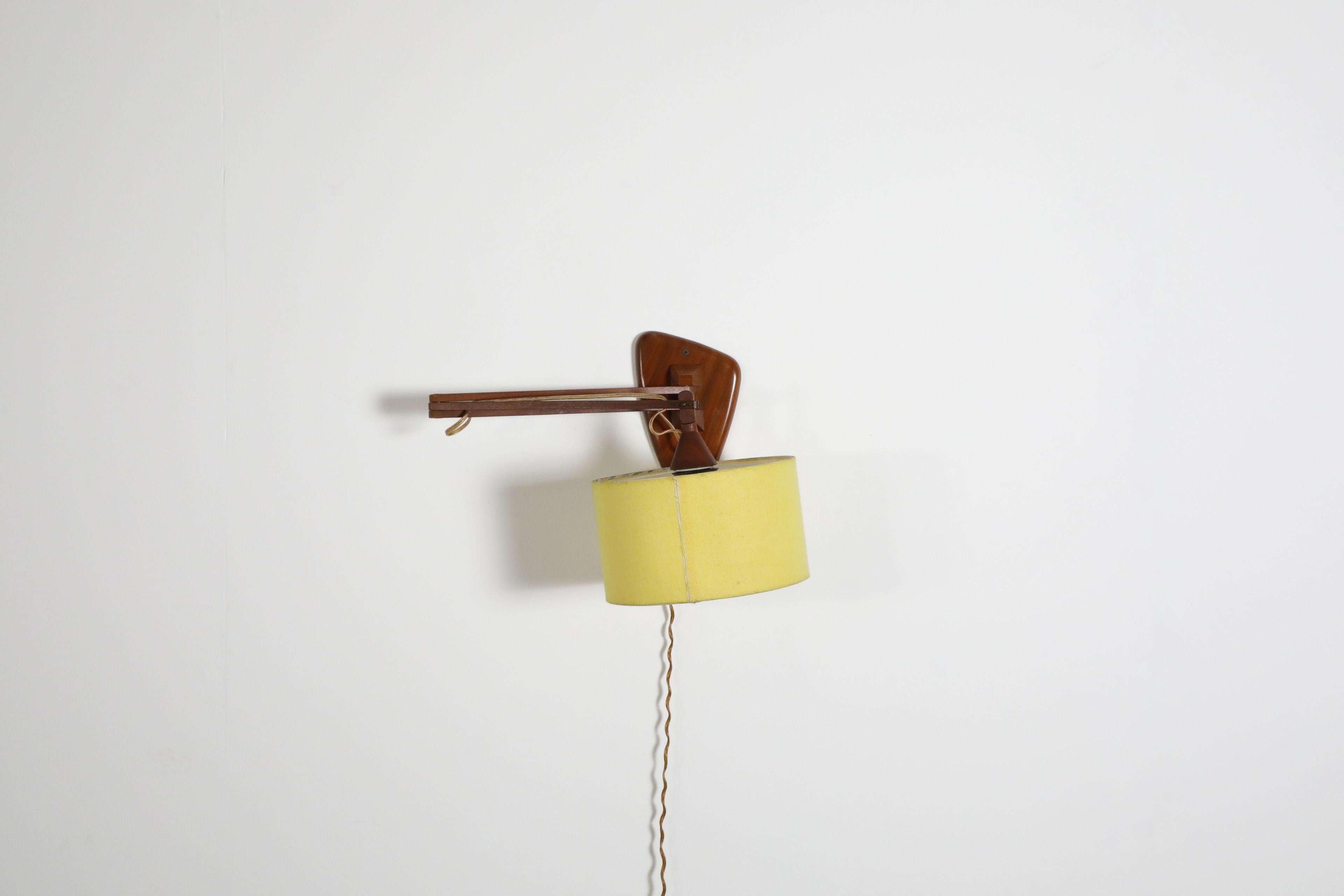 Mid-Century, Teak Wall Lamp with Articulating Arm and Yellow Shade For Sale 3
