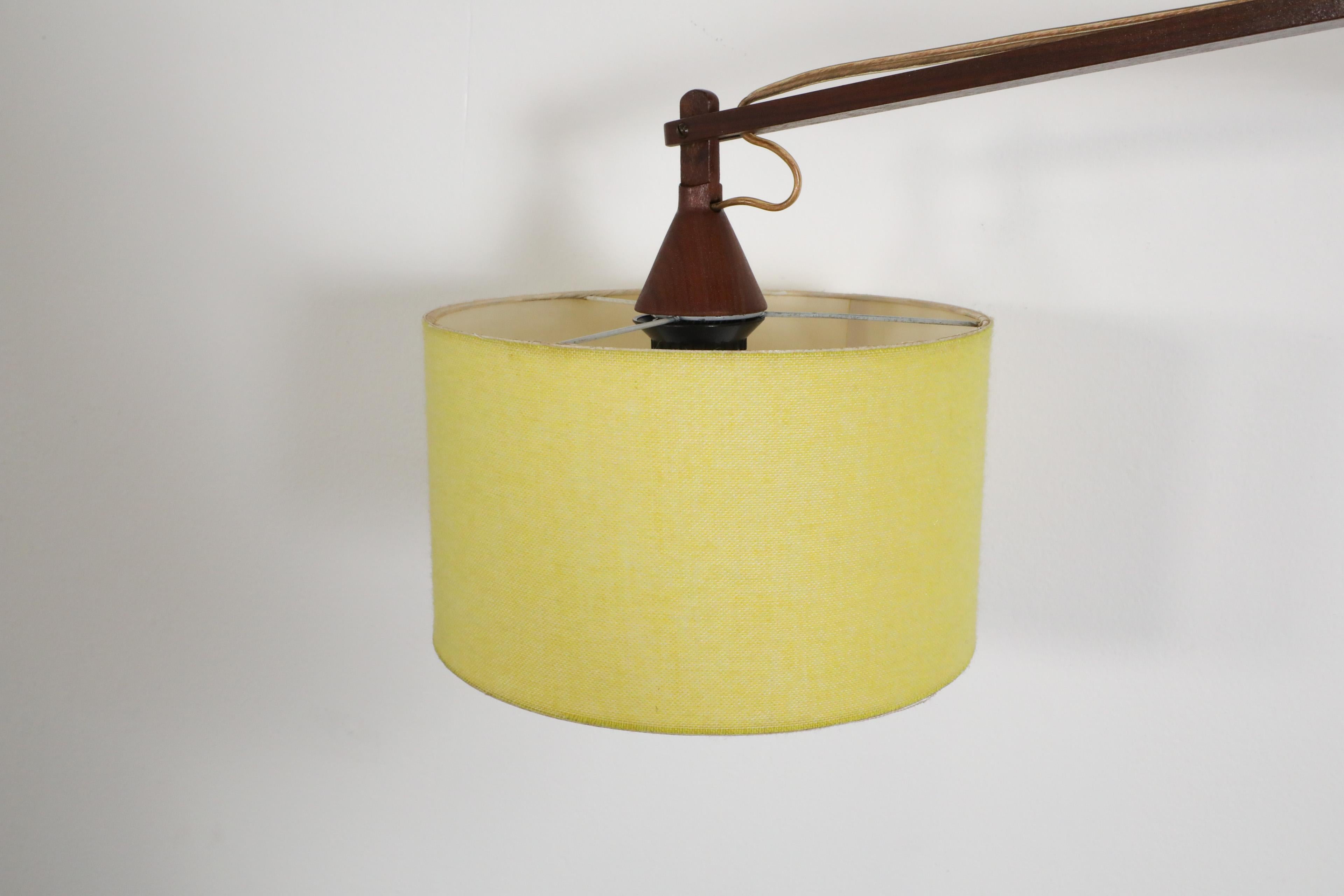 Mid-Century, Teak Wall Lamp with Articulating Arm and Yellow Shade For Sale 9