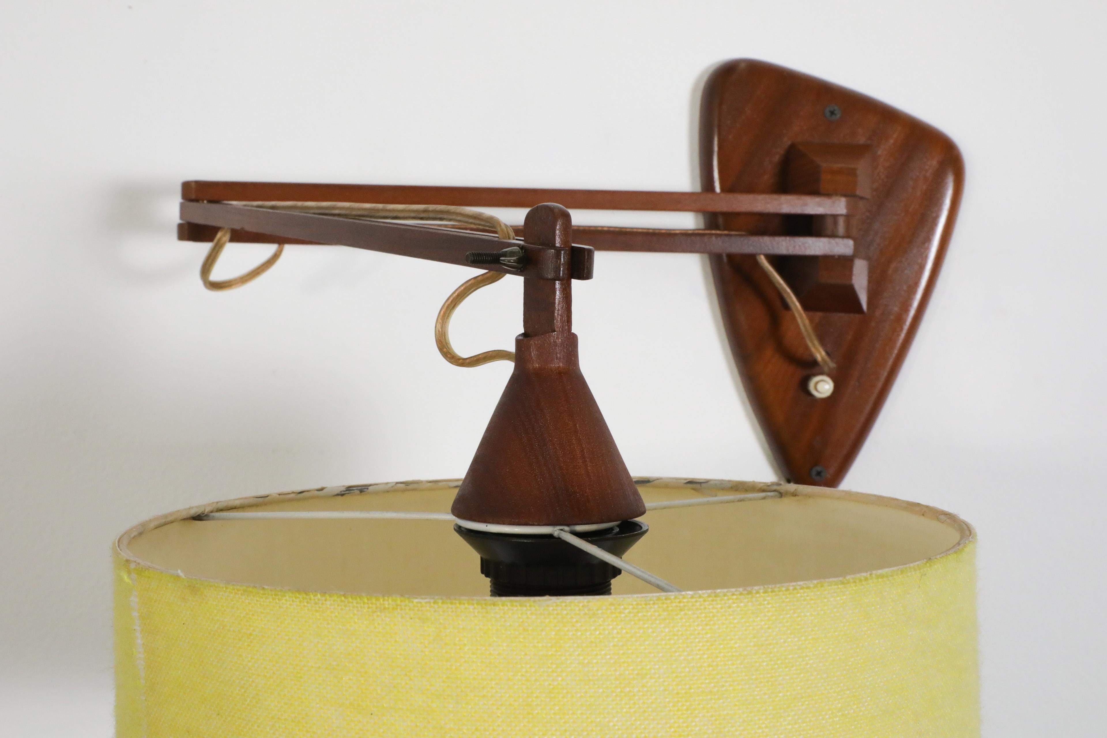 Mid-Century, Teak Wall Lamp with Articulating Arm and Yellow Shade For Sale 10
