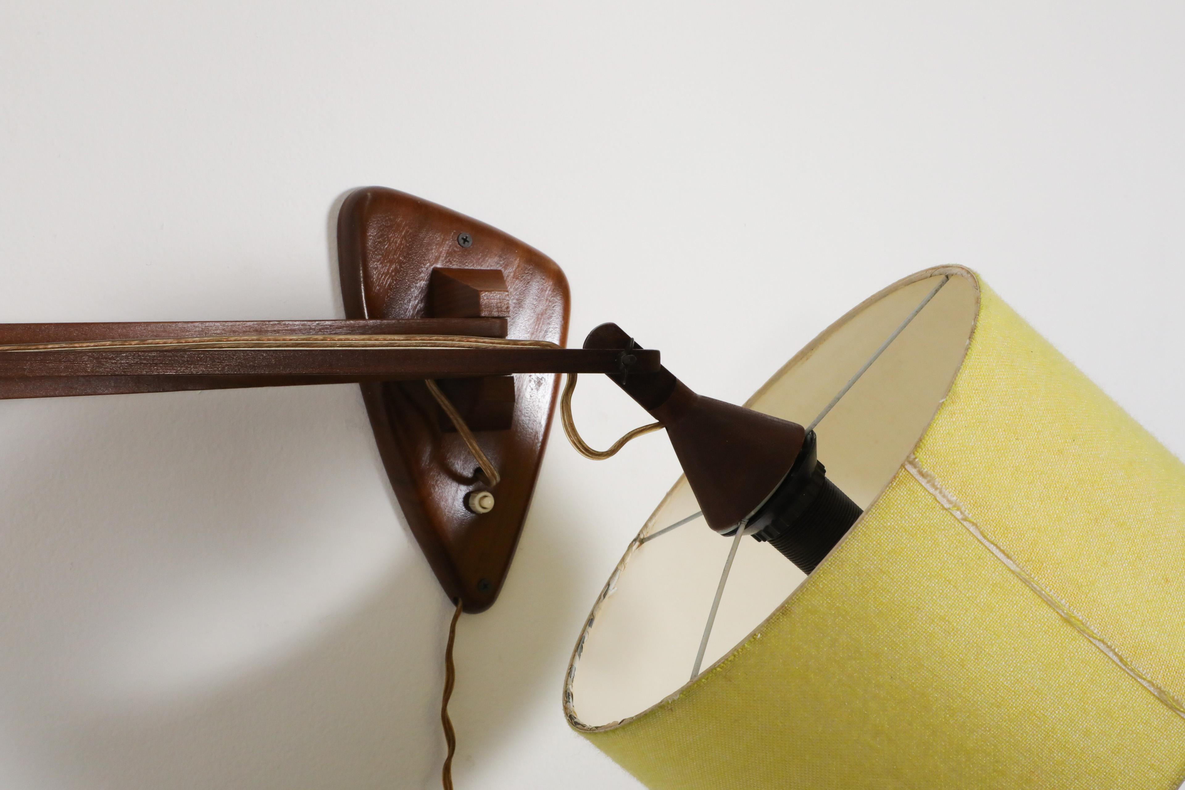Mid-Century, Teak Wall Lamp with Articulating Arm and Yellow Shade For Sale 11
