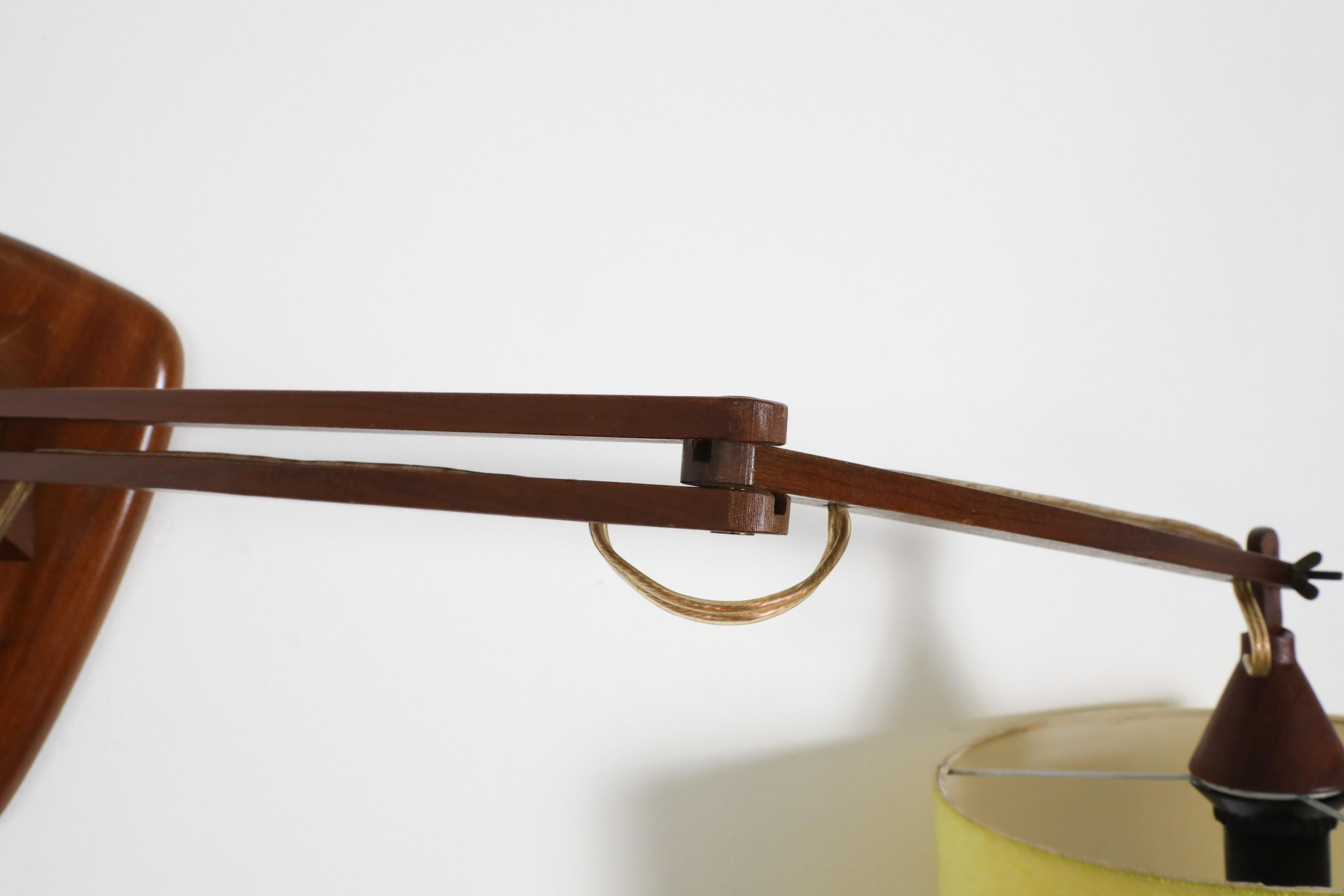 Mid-Century, Teak Wall Lamp with Articulating Arm and Yellow Shade For Sale 13