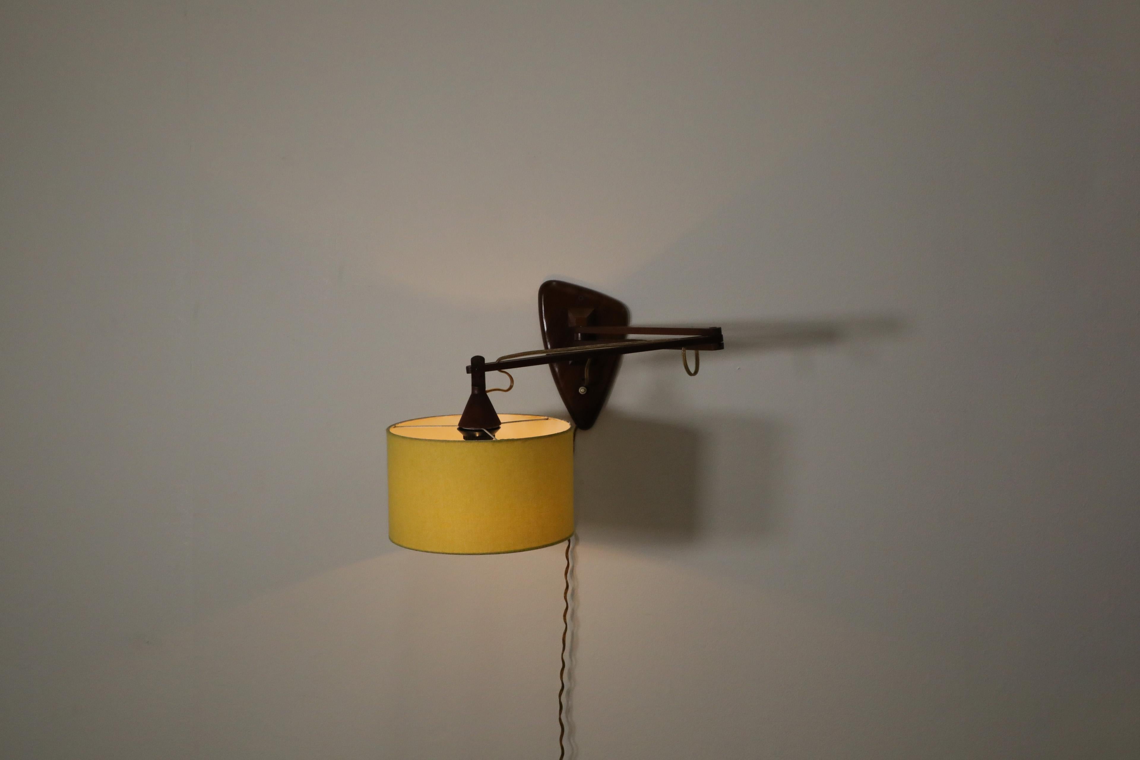 Dutch Mid-Century, Teak Wall Lamp with Articulating Arm and Yellow Shade For Sale