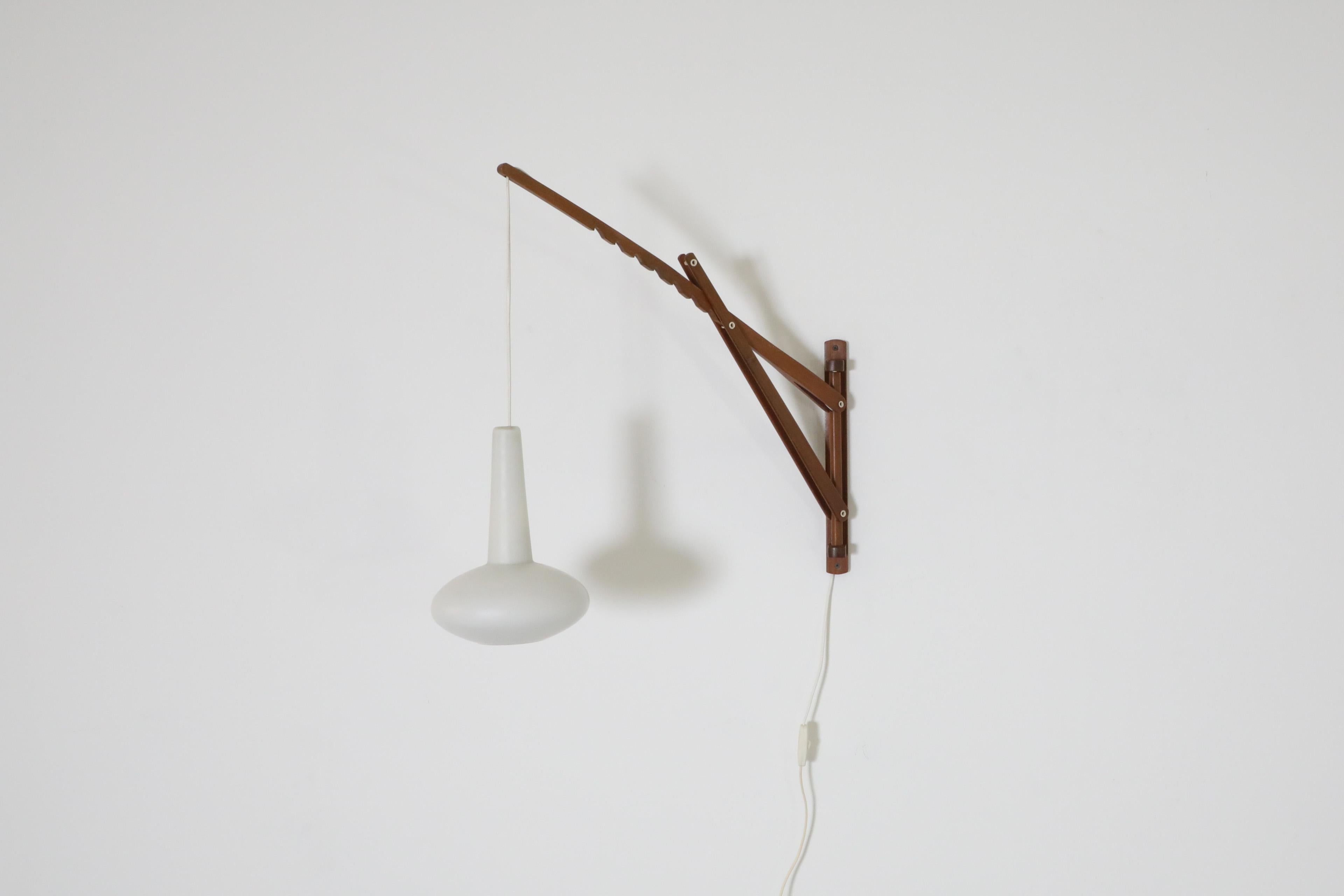Mid-20th Century Mid-Century Teak Wall Mount Sconce with Milk Glass Pendant For Sale