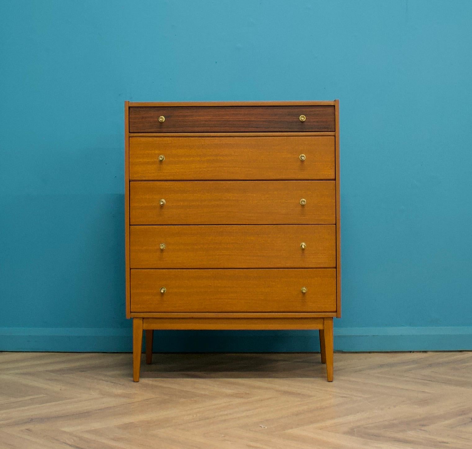 A teak & walnut tallboy chest of drawers from William Lawrence
Featuring 5 drawers